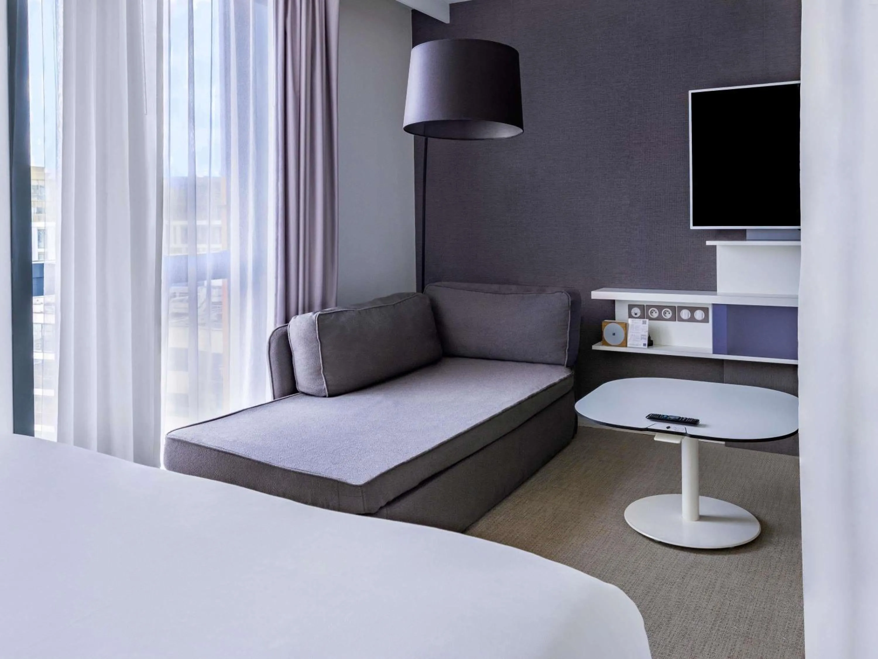 Bedroom, Bed in Novotel Suites Paris Issy Les Moulineaux