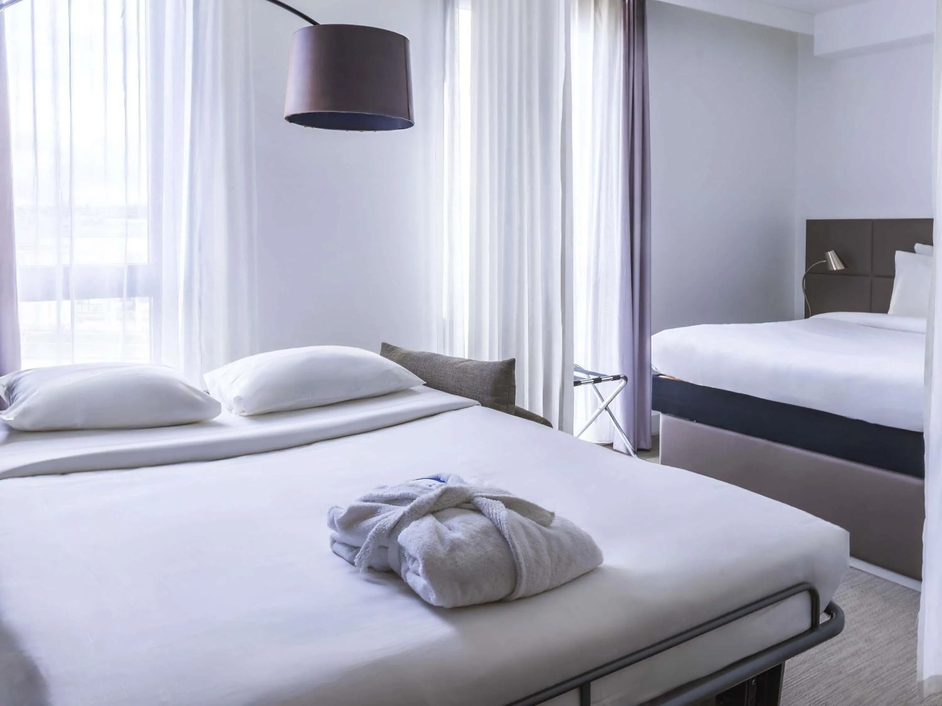 Bedroom, Bed in Novotel Suites Paris Issy Les Moulineaux