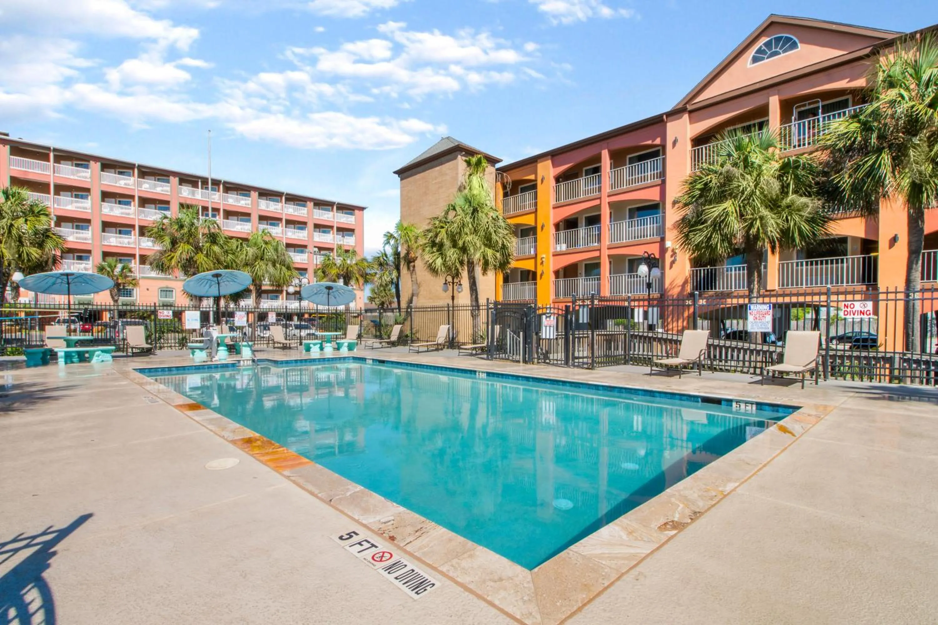 Pool view in Beachfront Palms Hotel Galveston