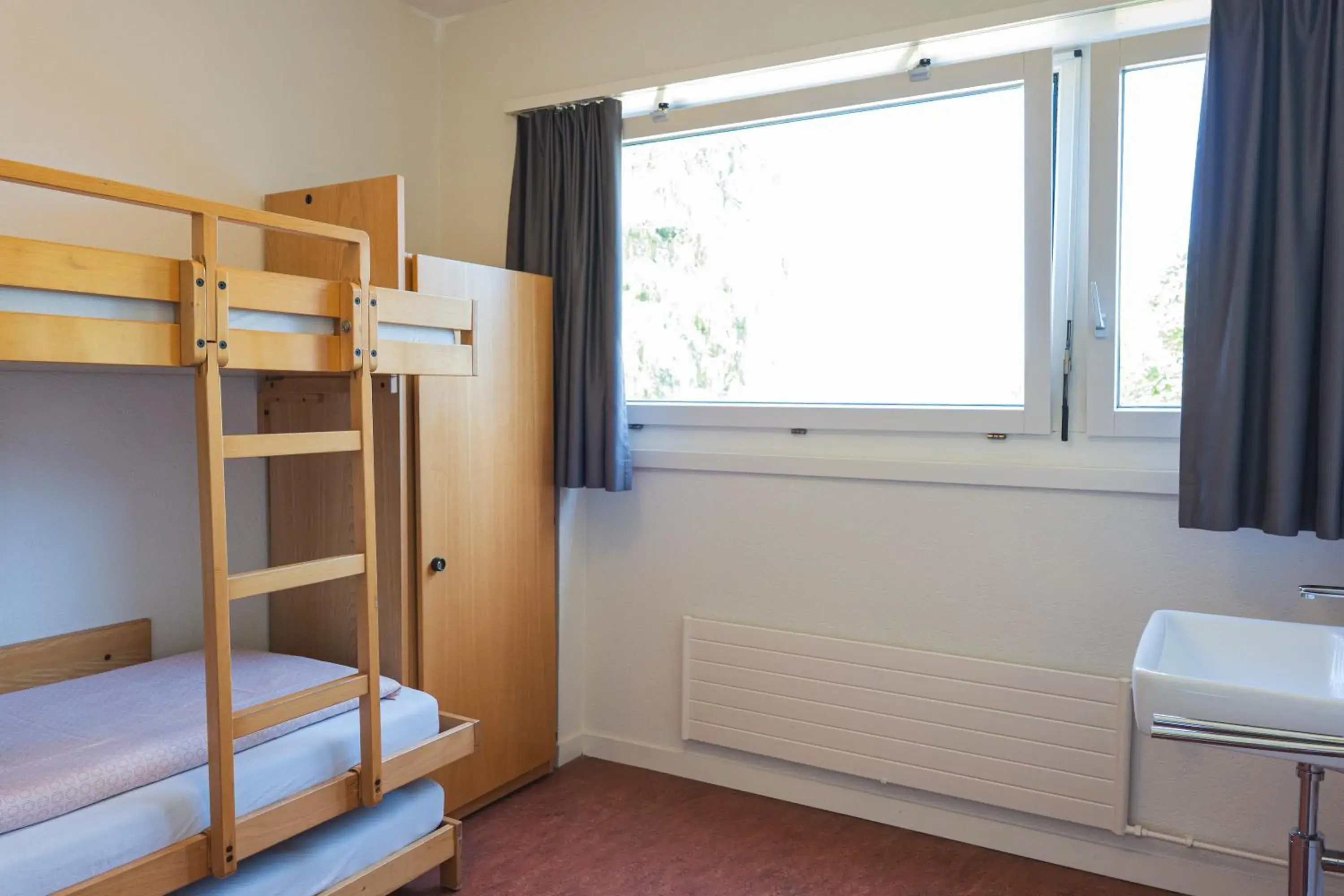 Twin Room with Shared Bathroom in St. Gallen Youth Hostel Twin Room with Shared Bathroom in St. Gallen Youth Hostel