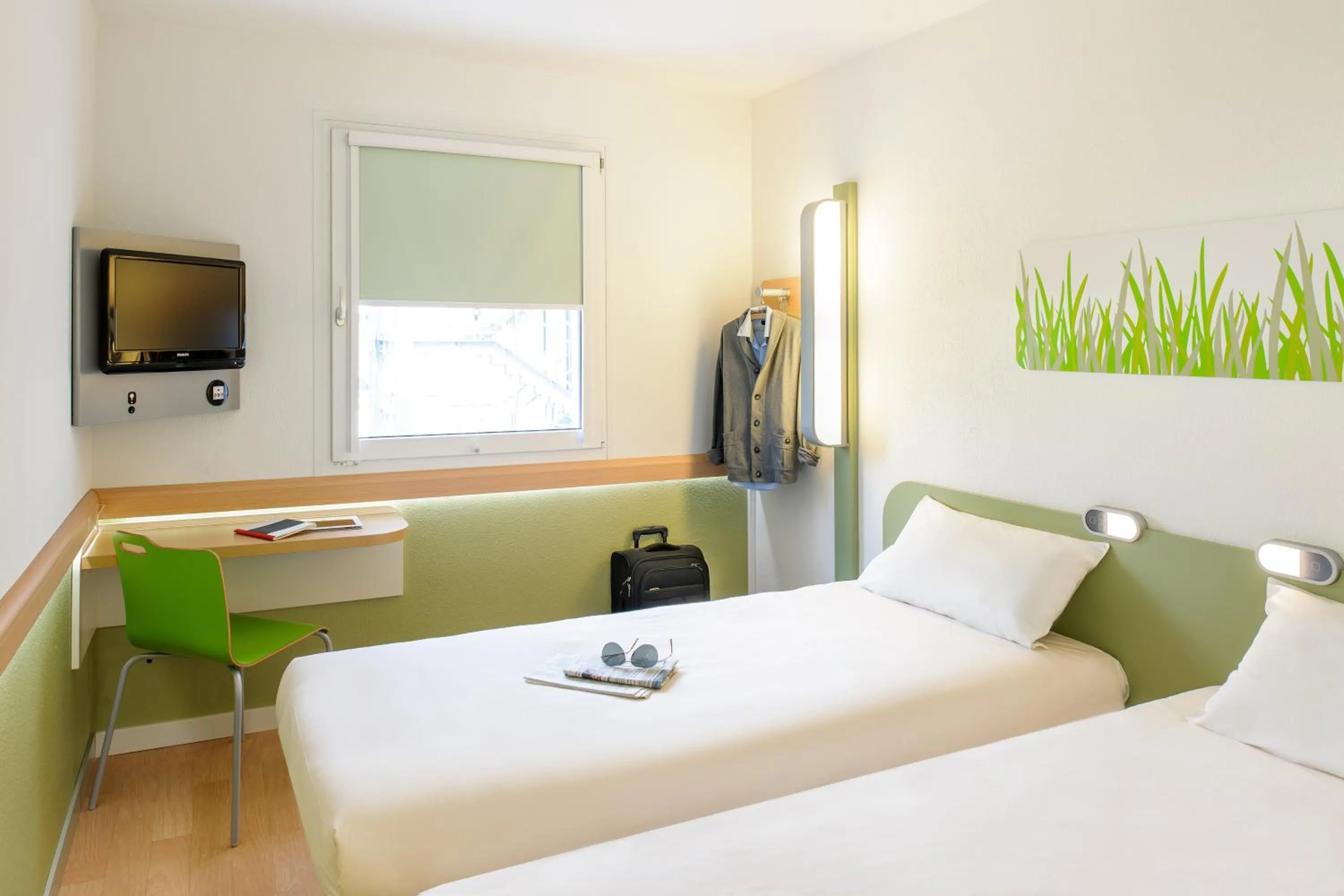 Photo of the whole room, Bed in ibis budget Flensburg City
