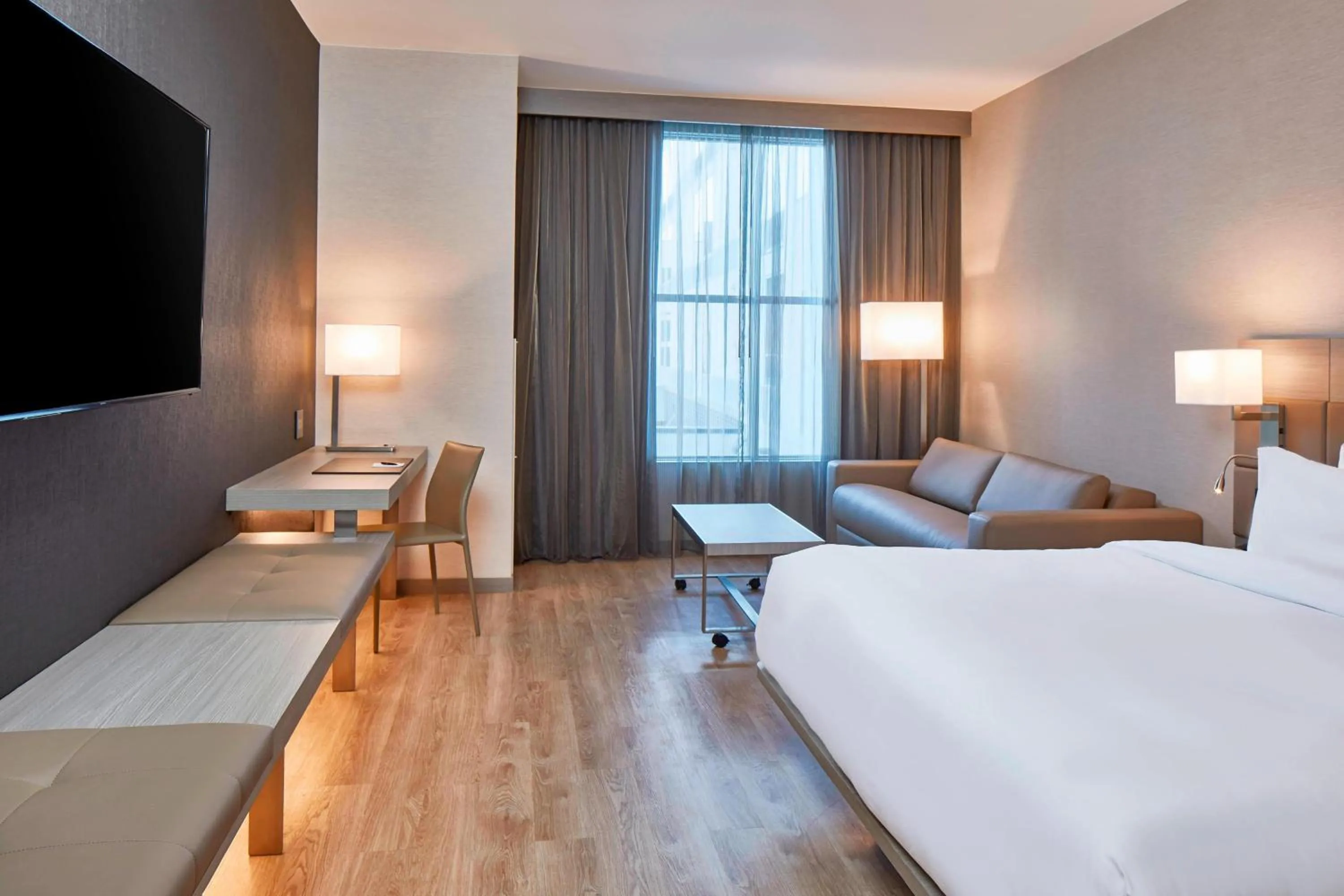 Photo of the whole room, Bed in AC Hotel Nashville Downtown