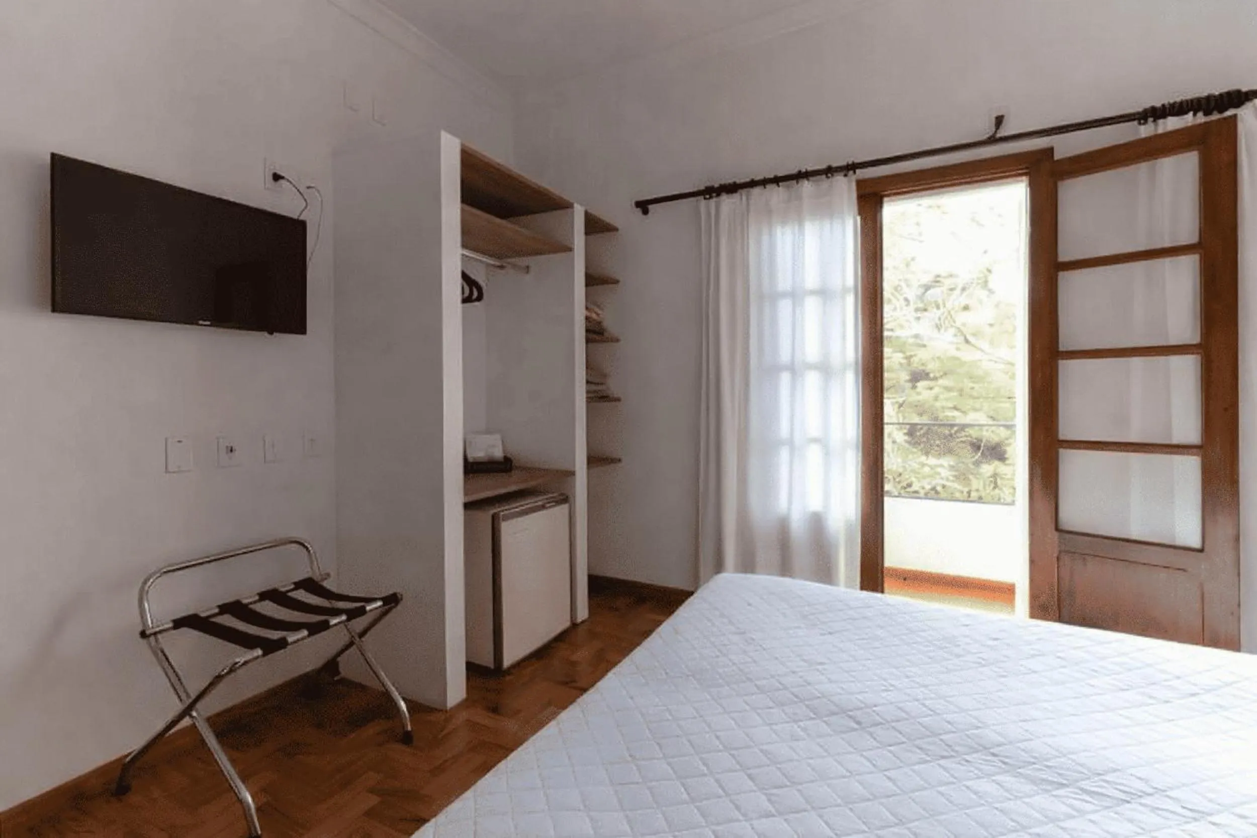 Bed in VOA Hotel União