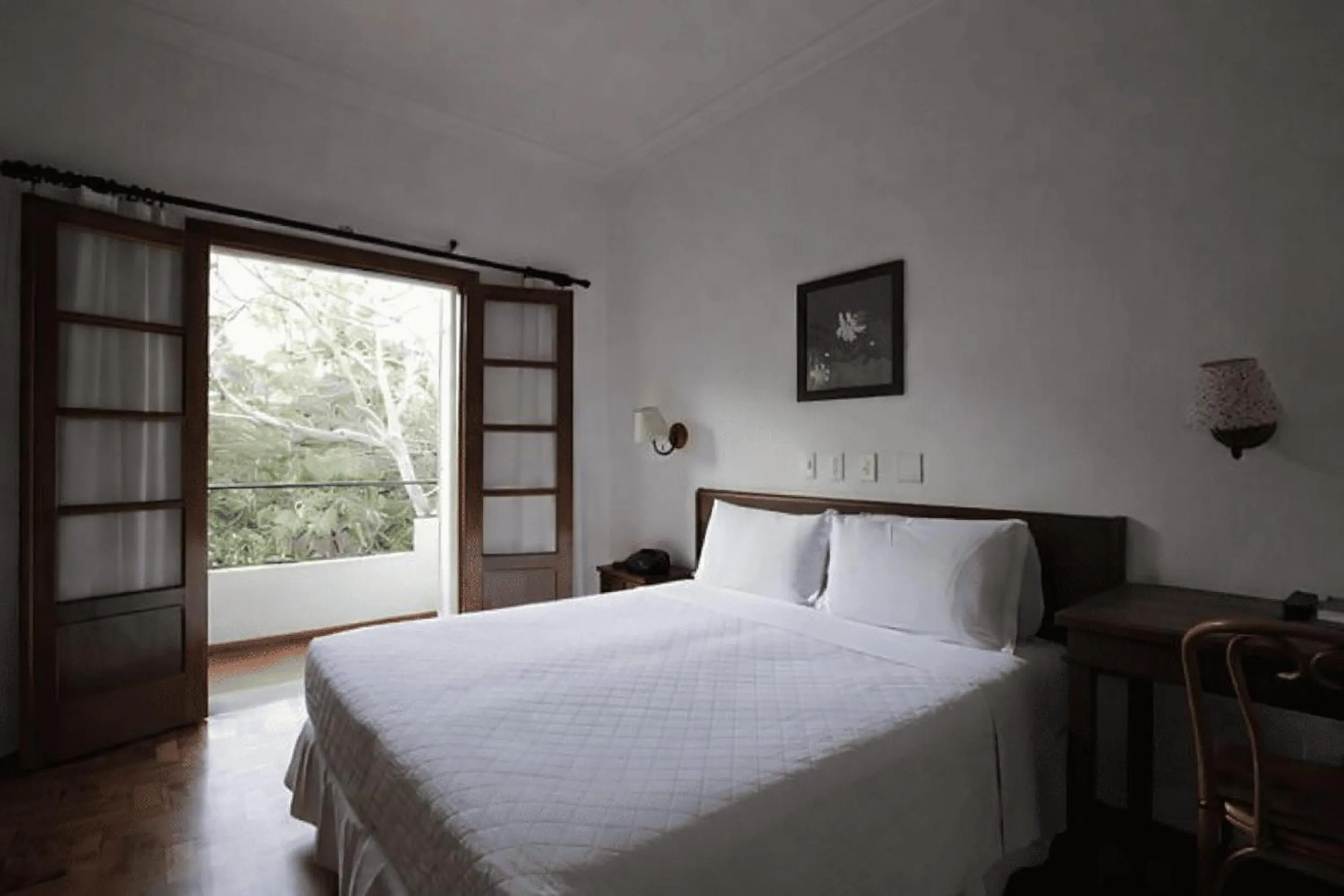 Bed in VOA Hotel União