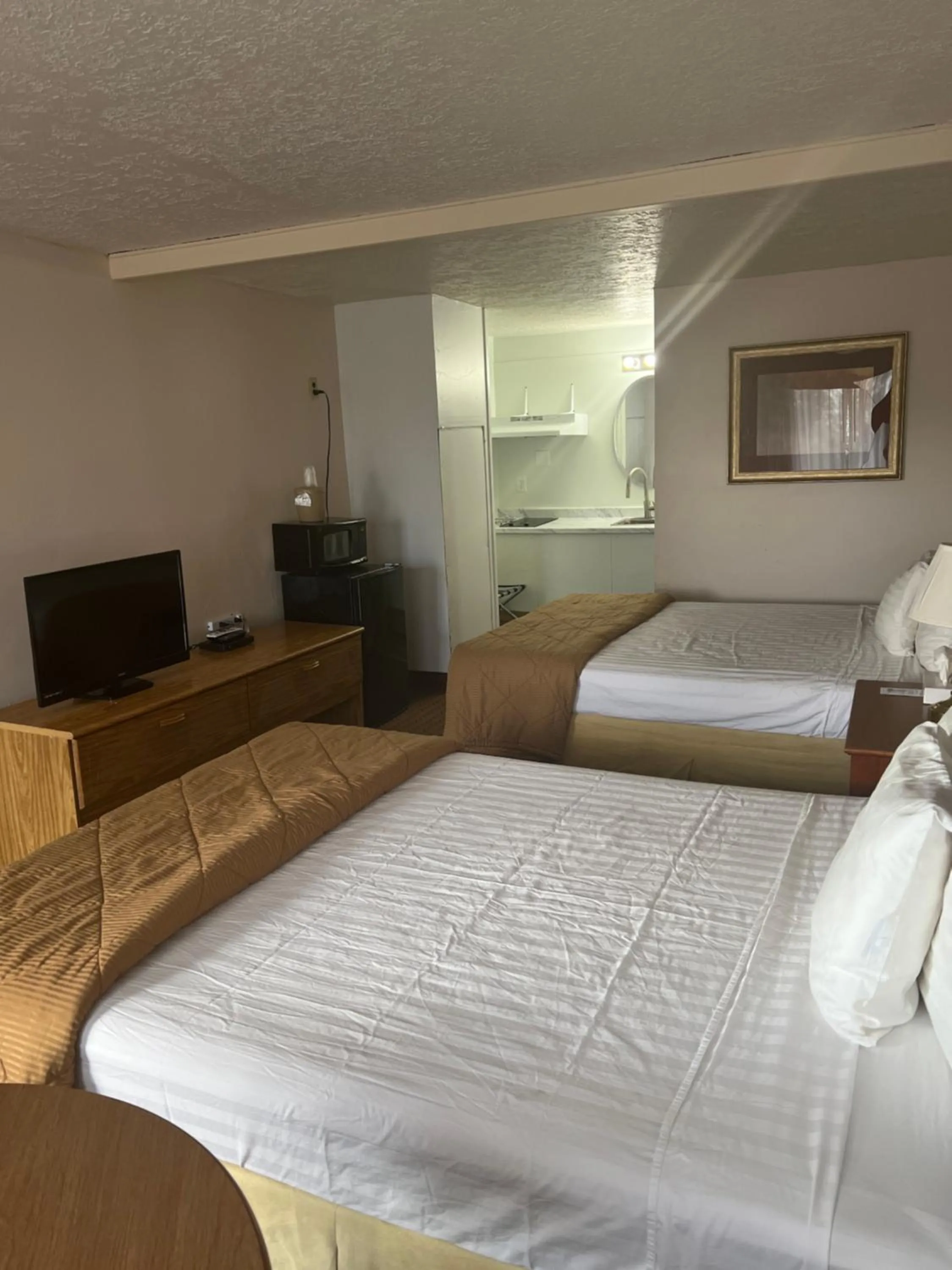 Bed in Prospector Motor Lodge