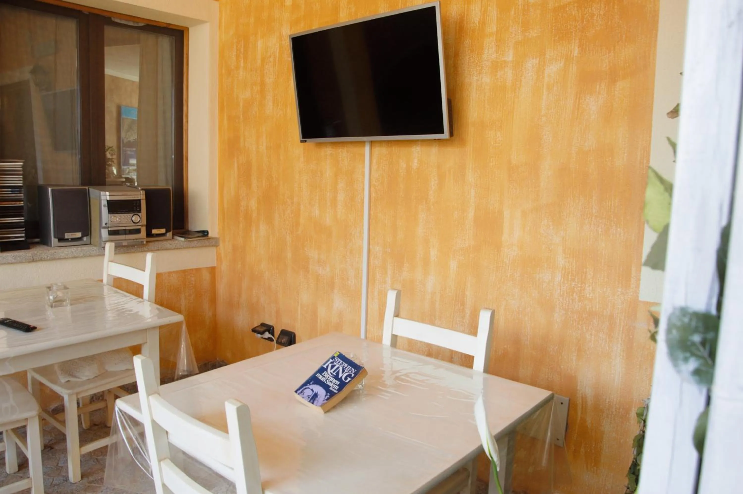 Communal lounge/ TV room in Hotel Sa Cralla Villasimius