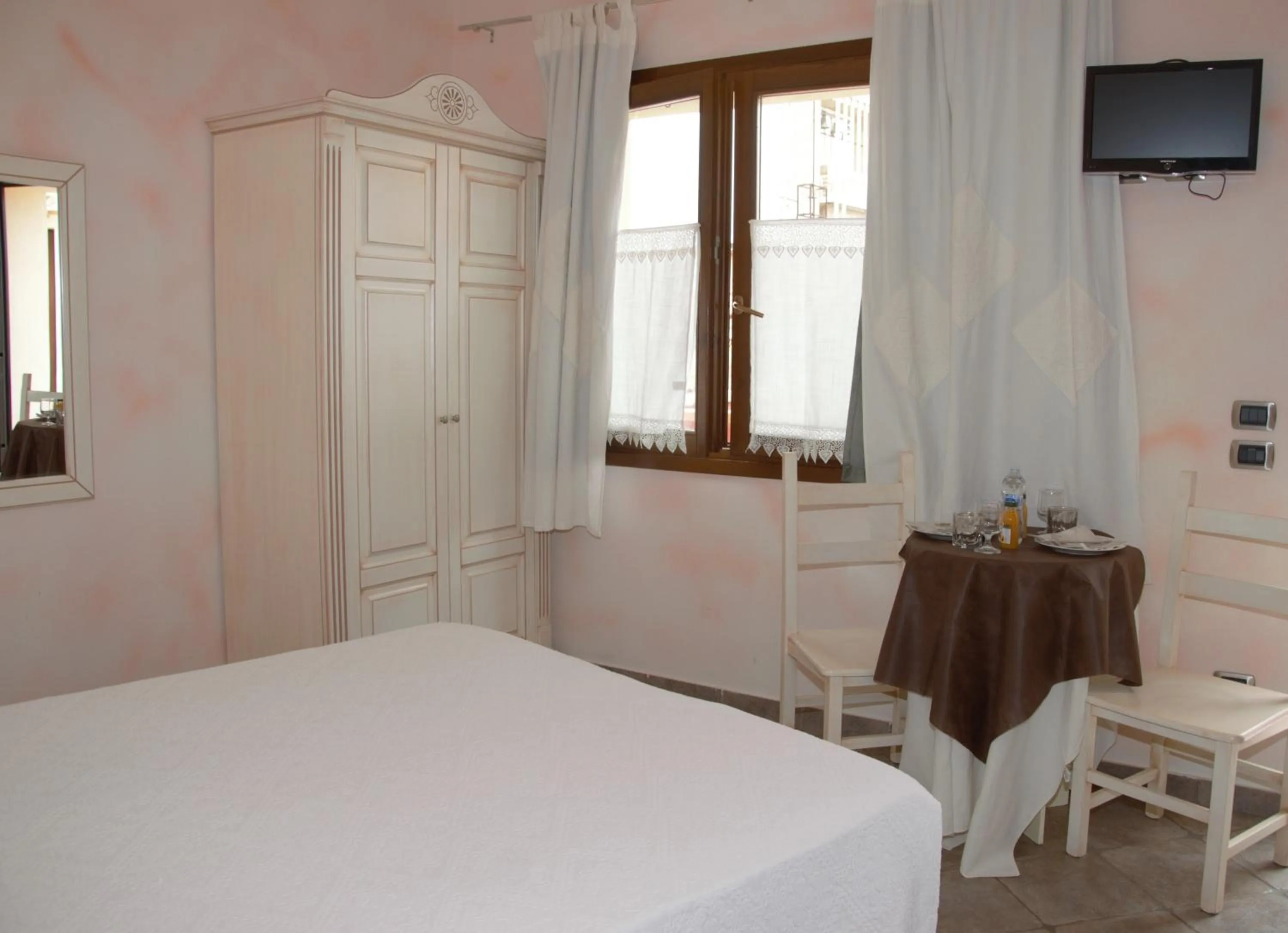 Photo of the whole room, Bed in Hotel Sa Cralla Villasimius