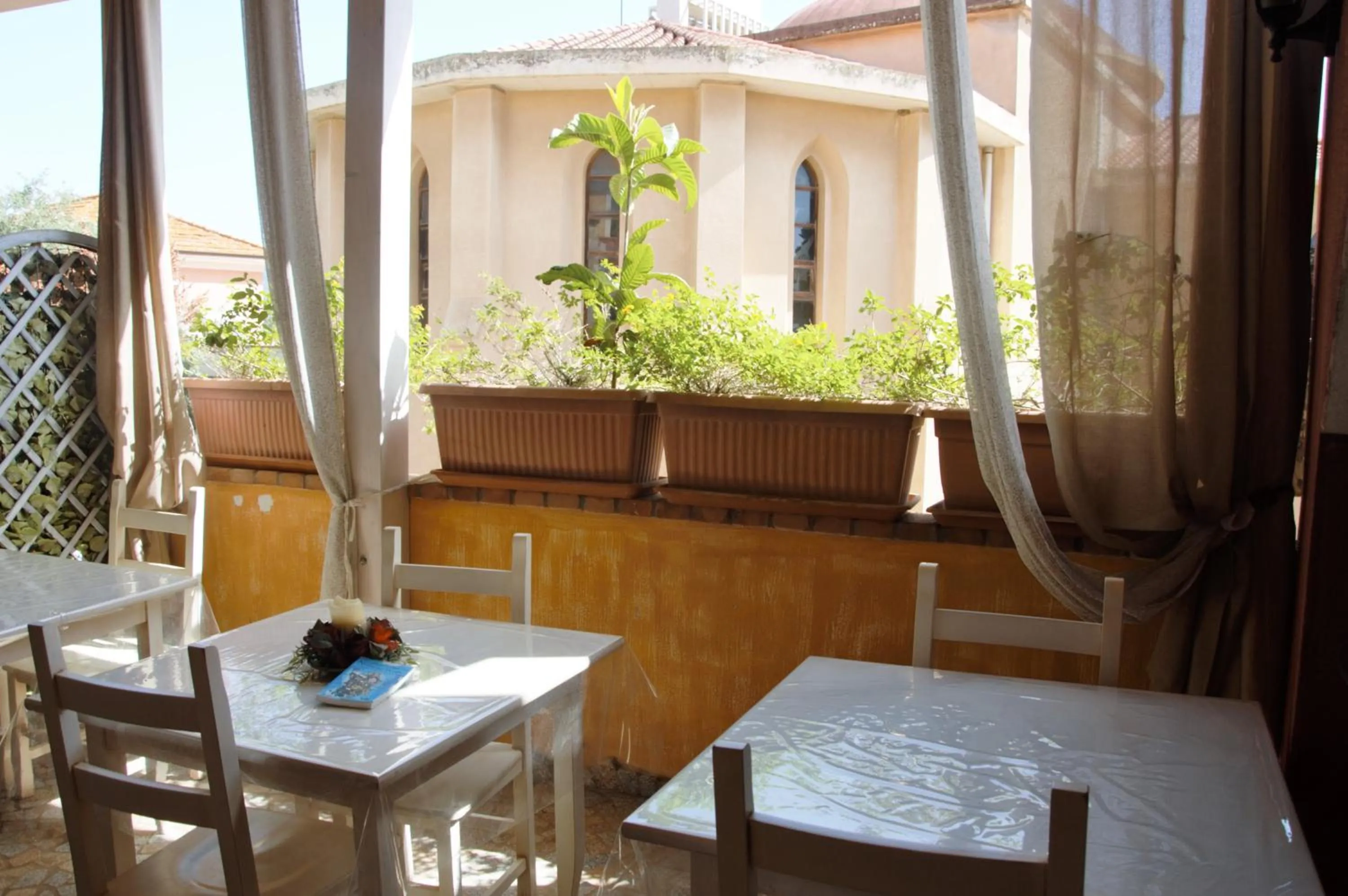 Communal lounge/ TV room in Hotel Sa Cralla Villasimius