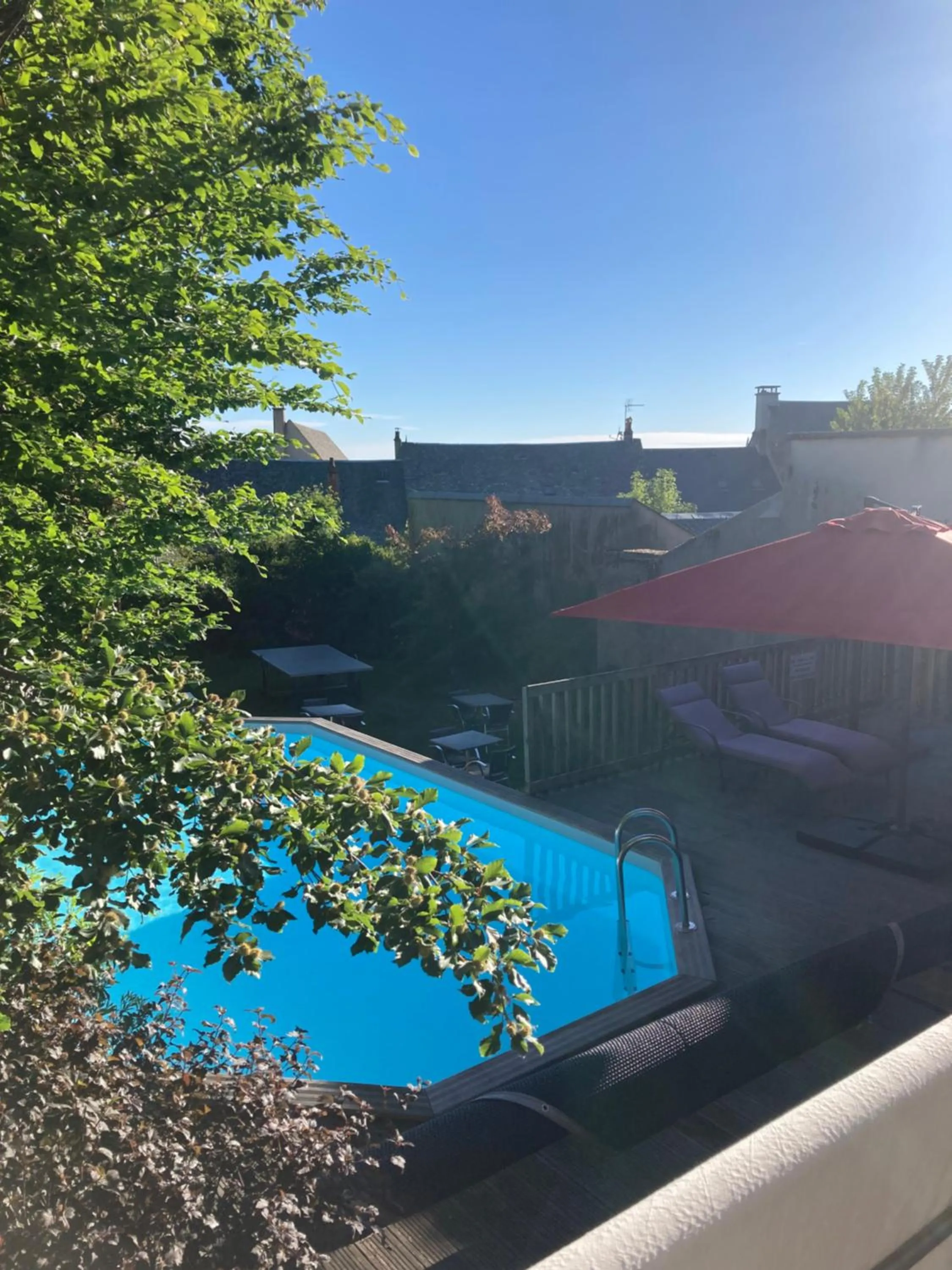 Swimming pool in Logis Hôtel Restaurant Gilles Moreau Laguiole