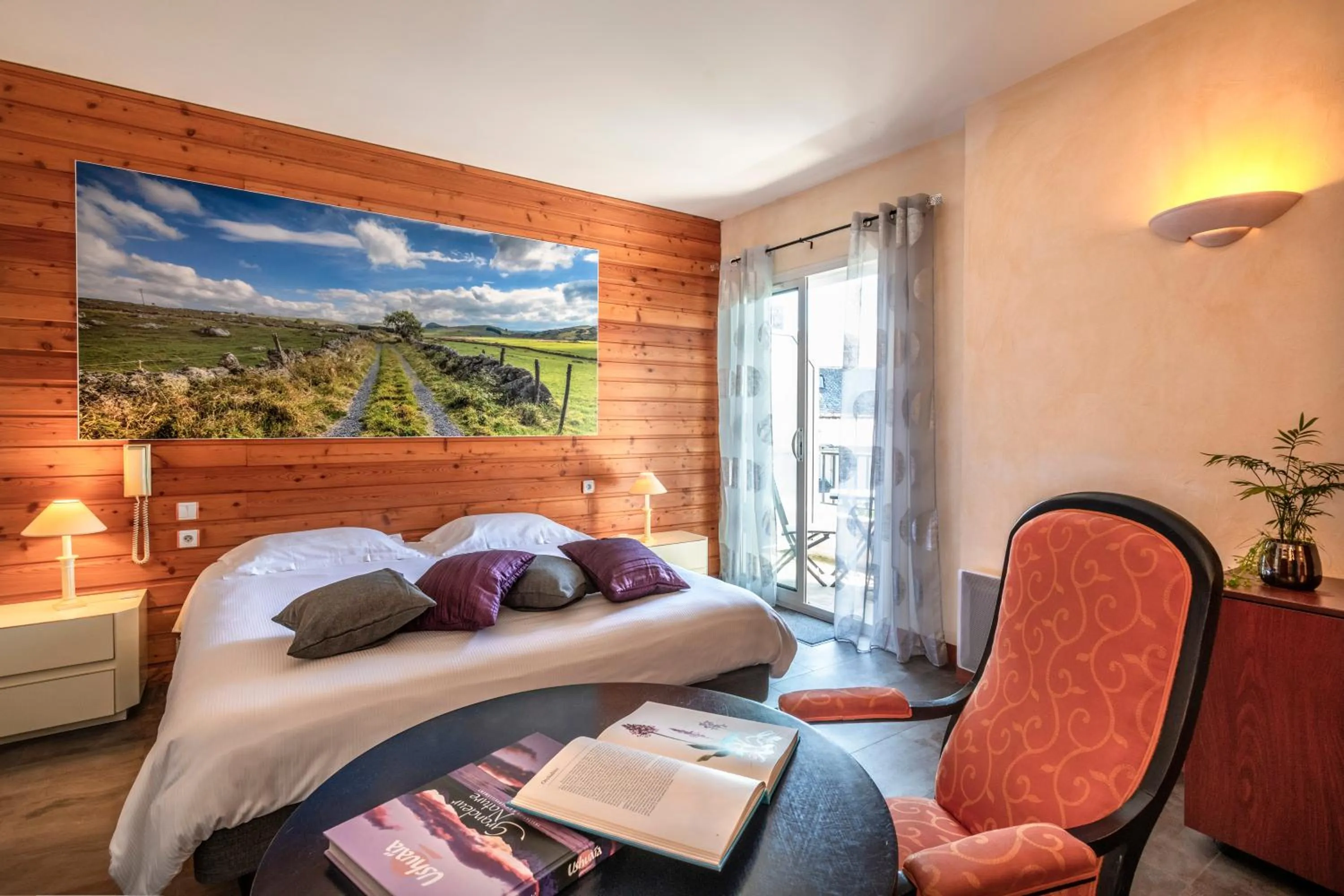 Seating area, Bed in Logis Hôtel Restaurant Gilles Moreau Laguiole