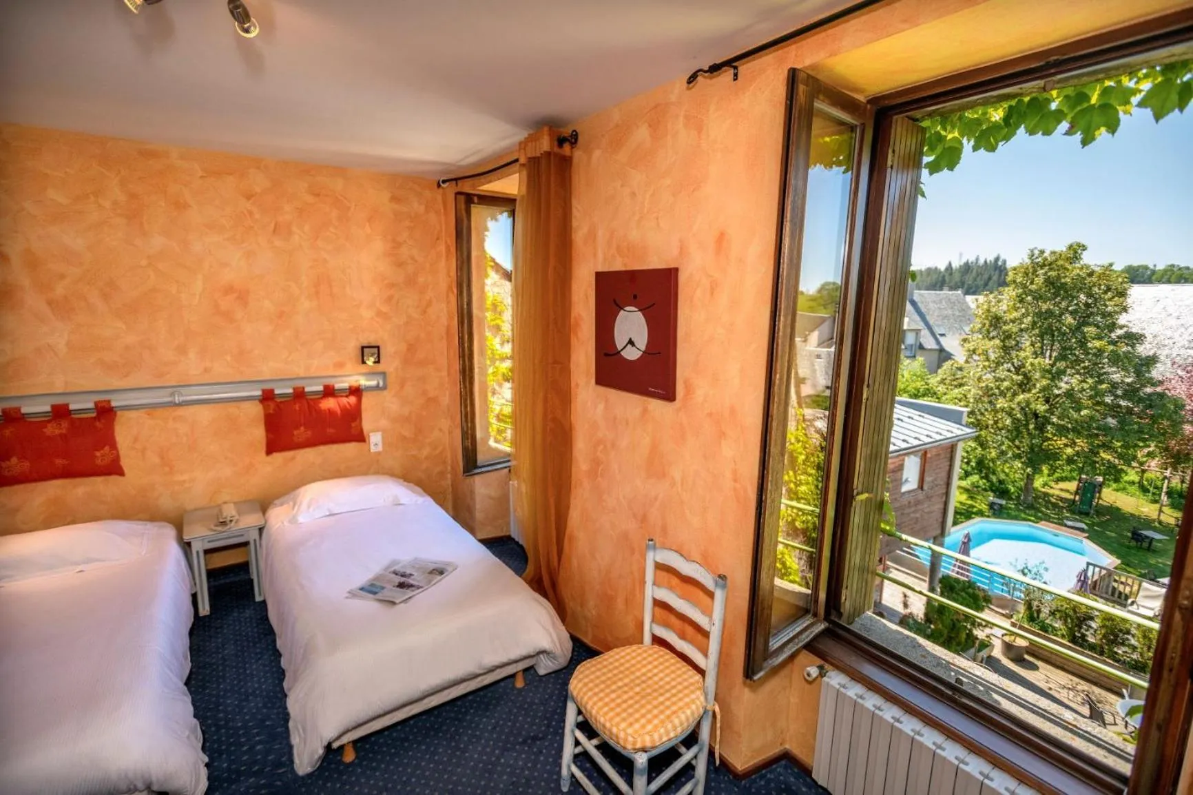 Day, Bed in Logis Hôtel Restaurant Gilles Moreau Laguiole