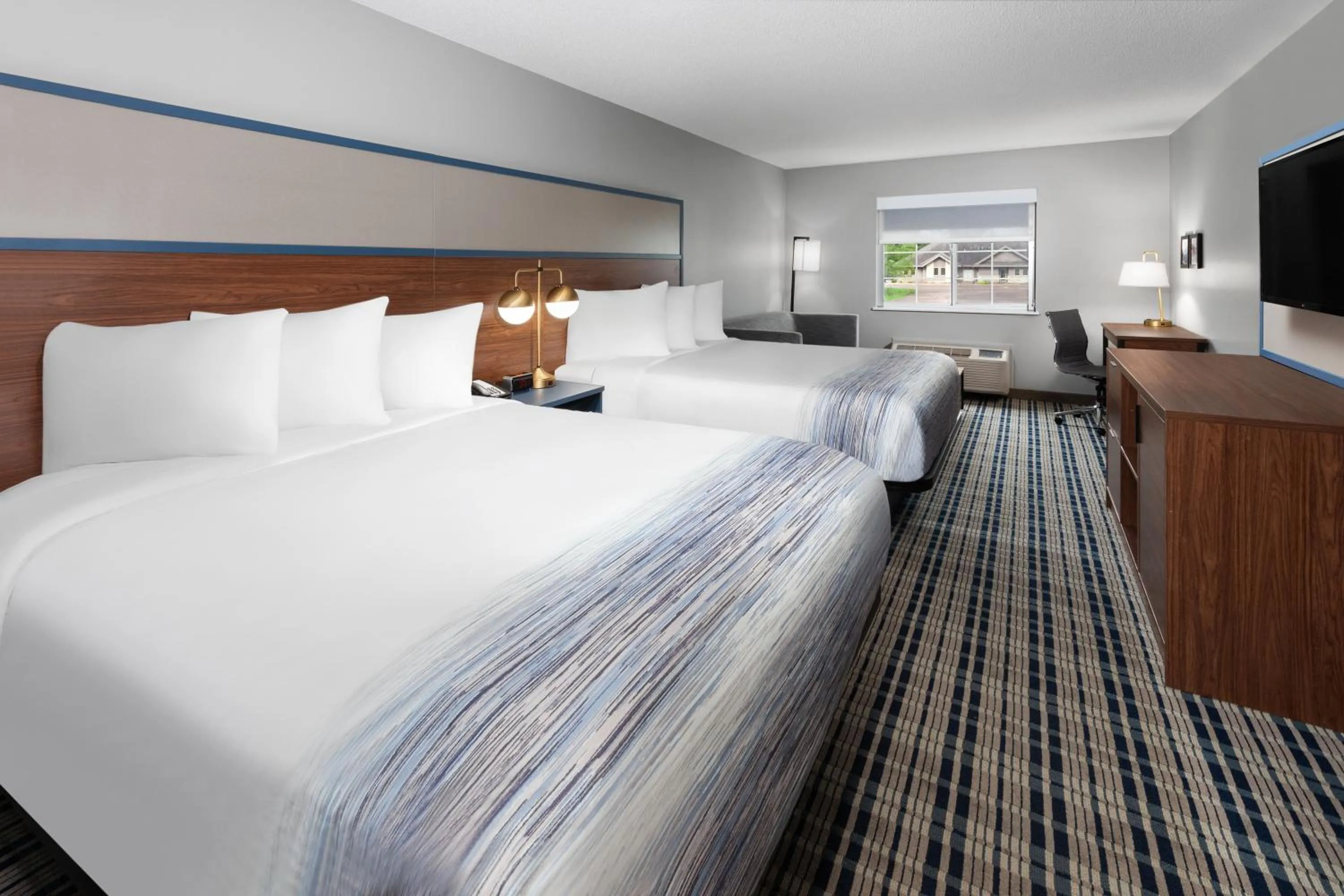 Bedroom, Bed in AmericInn by Wyndham Eagle River Downtown