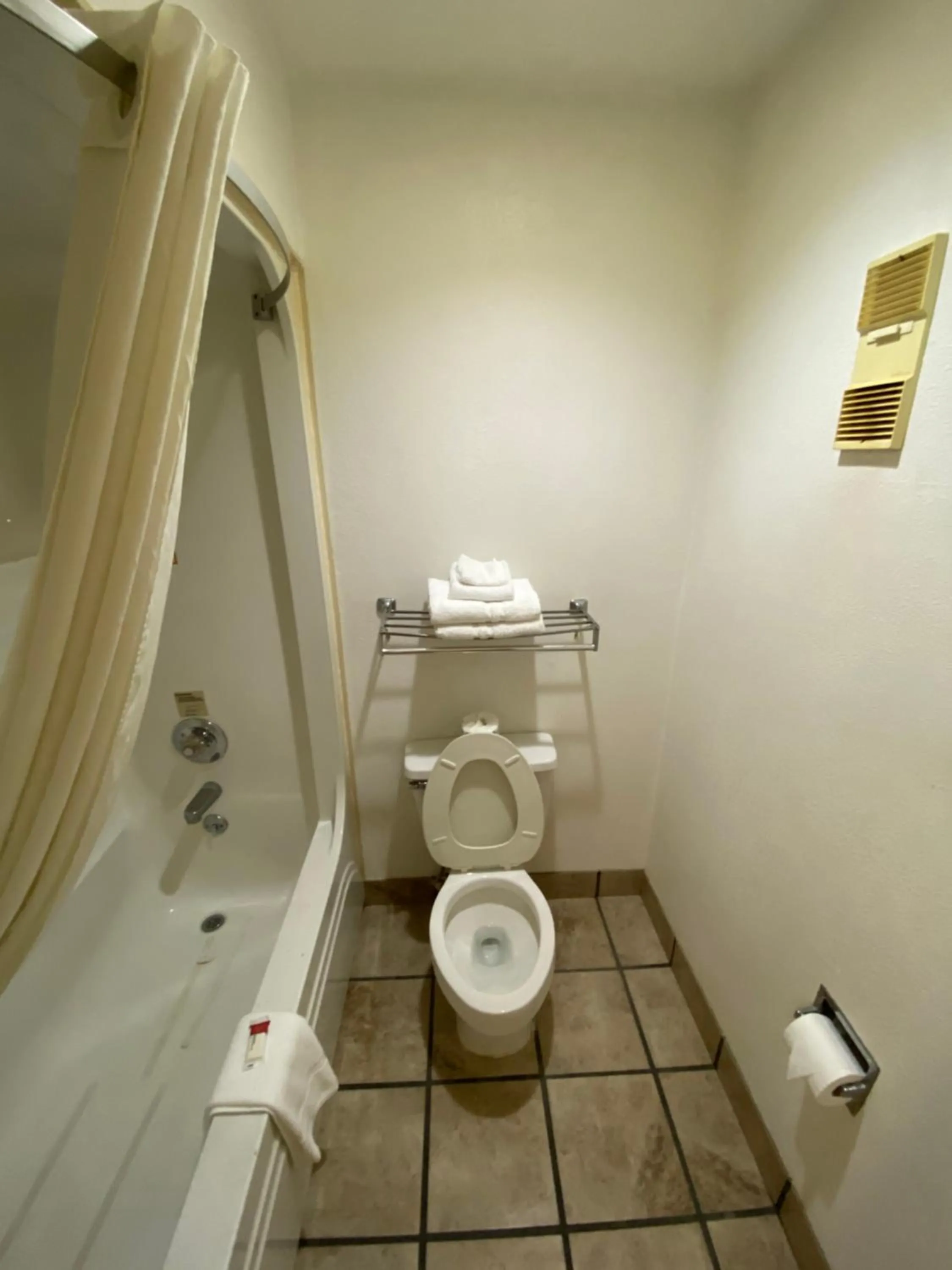 Bathroom in Super 8 by Wyndham Metropolis