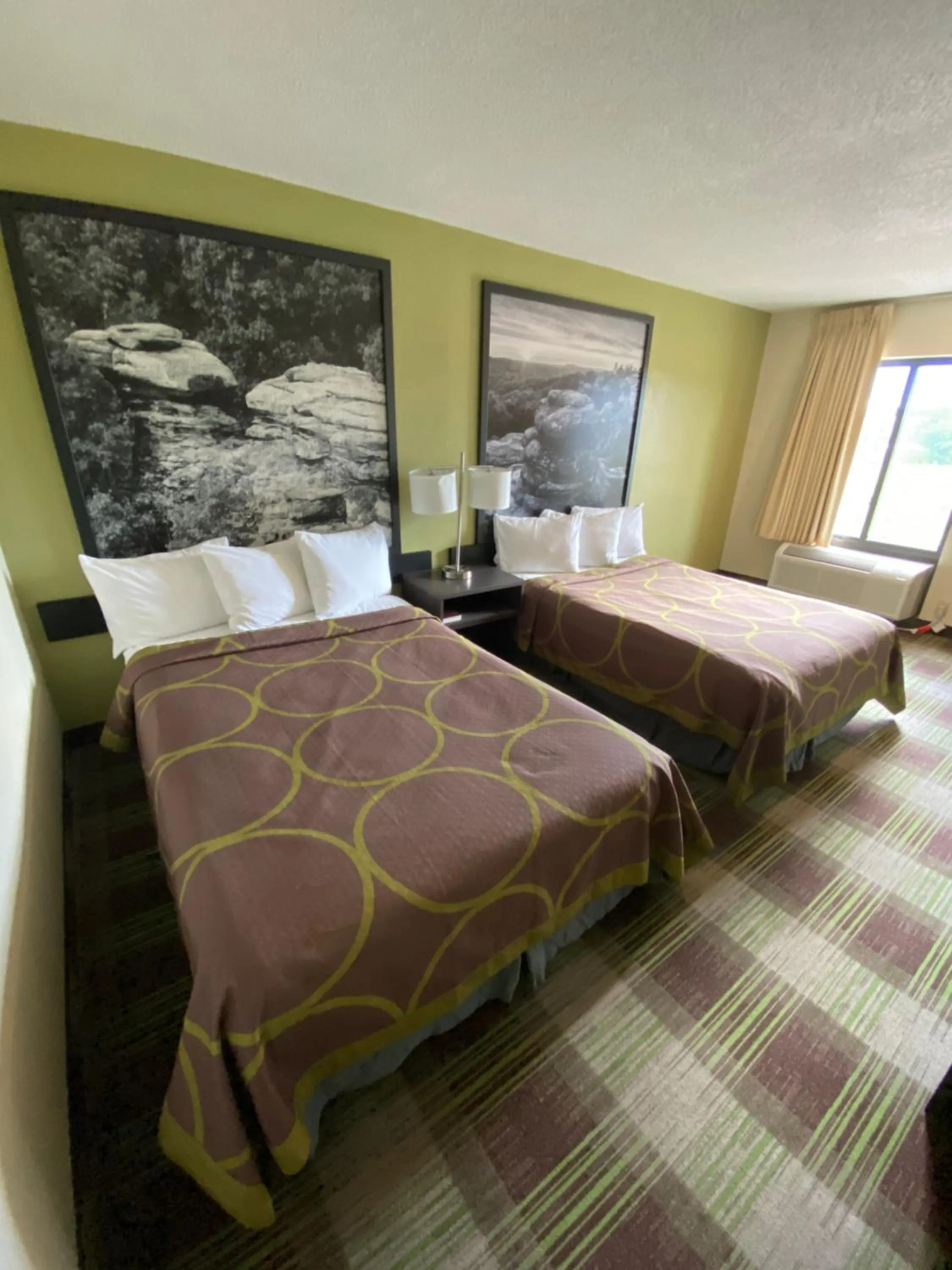 Bed in Super 8 by Wyndham Metropolis