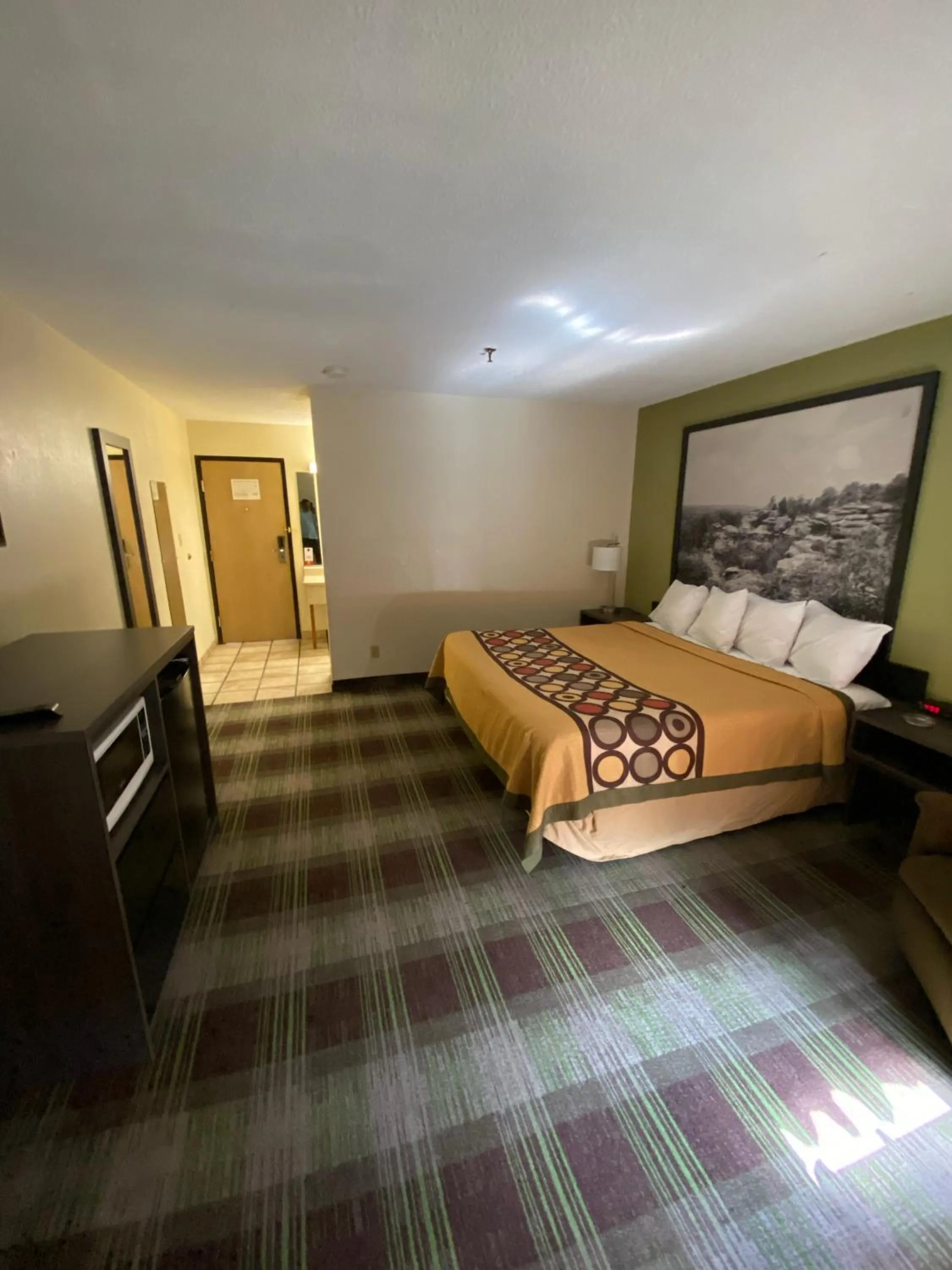 Bed in Super 8 by Wyndham Metropolis