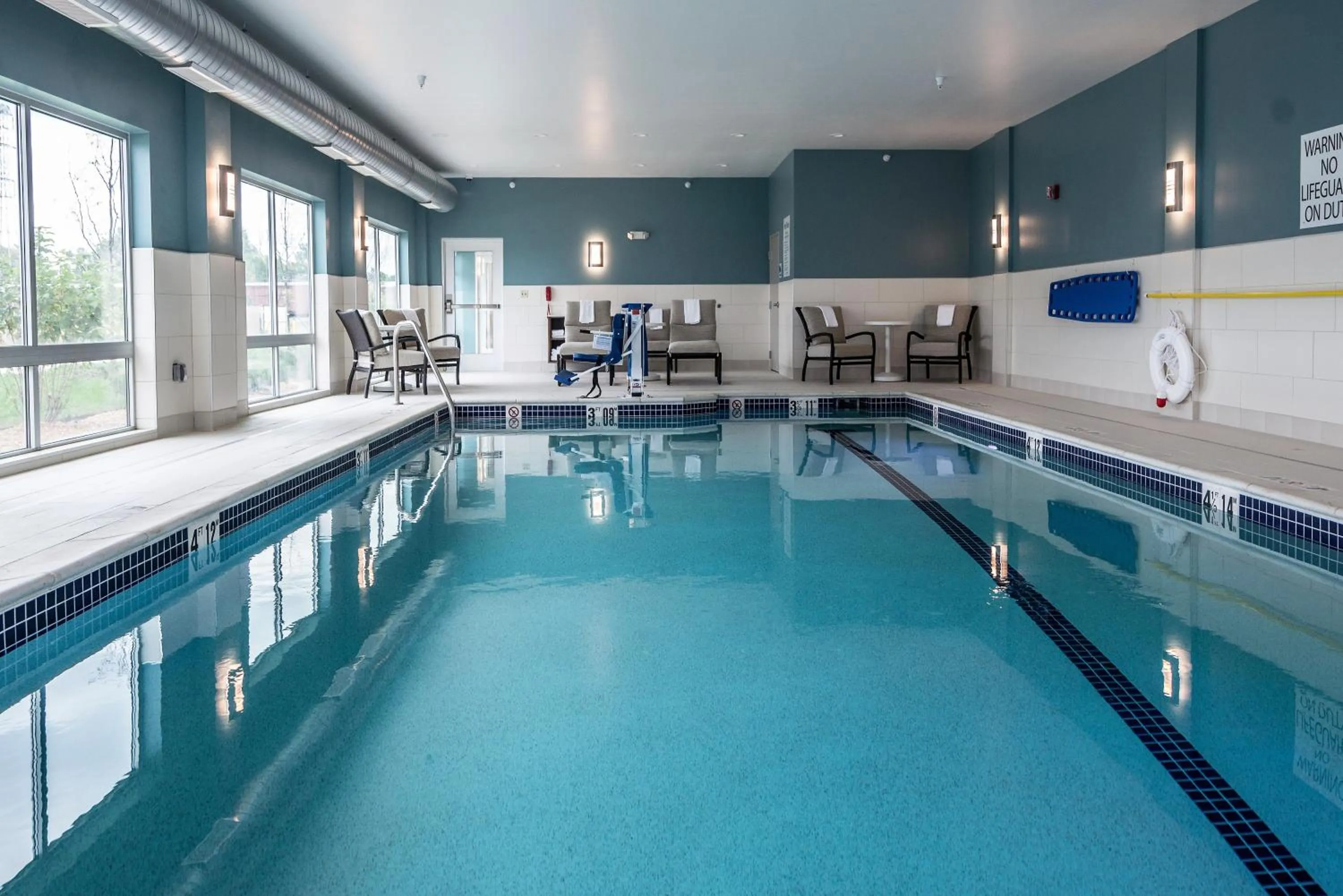 Swimming pool in Holiday Inn Express & Suites Allen Park by IHG