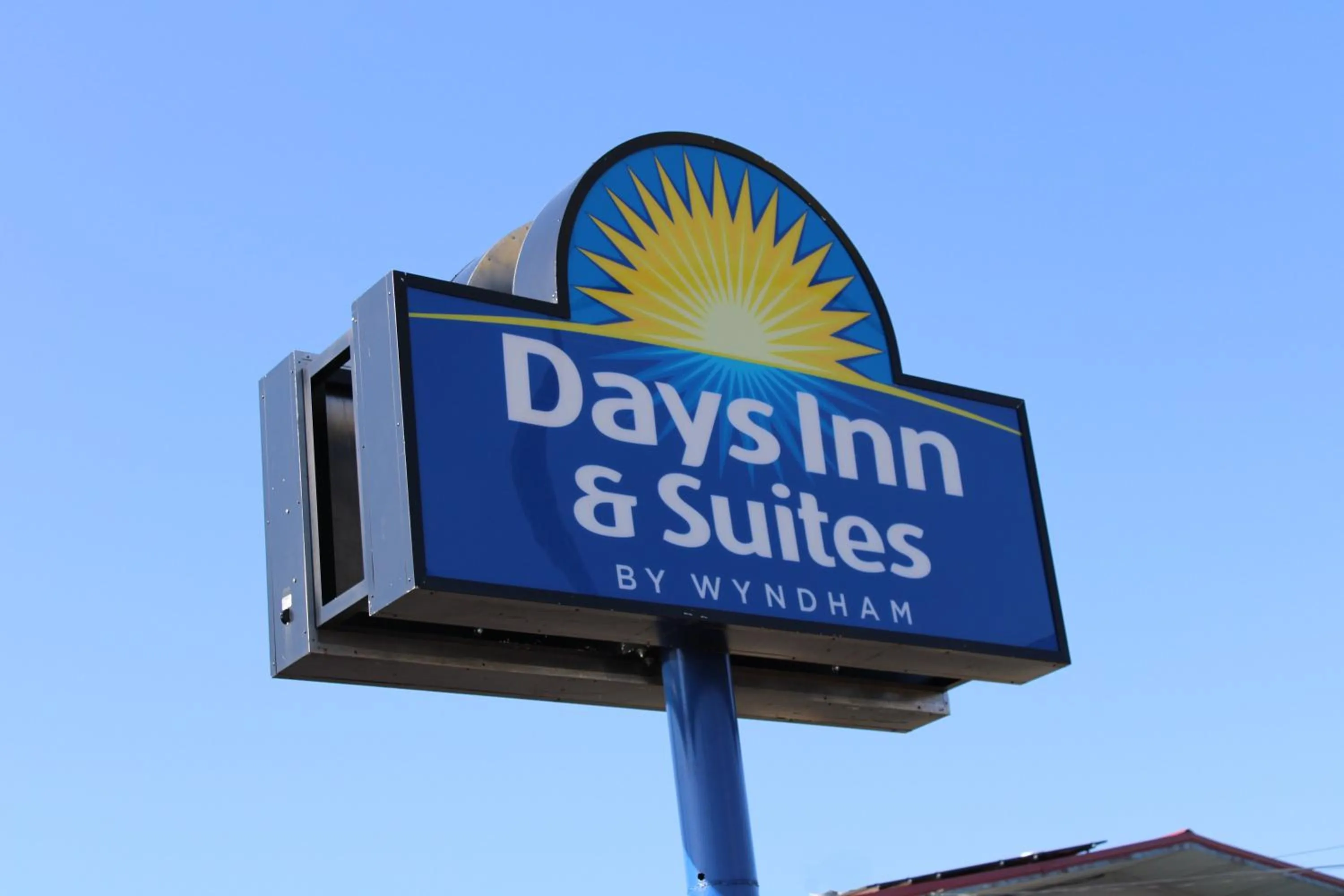 Property logo or sign in Days Inn & Suites by Wyndham Springfield on I-44
