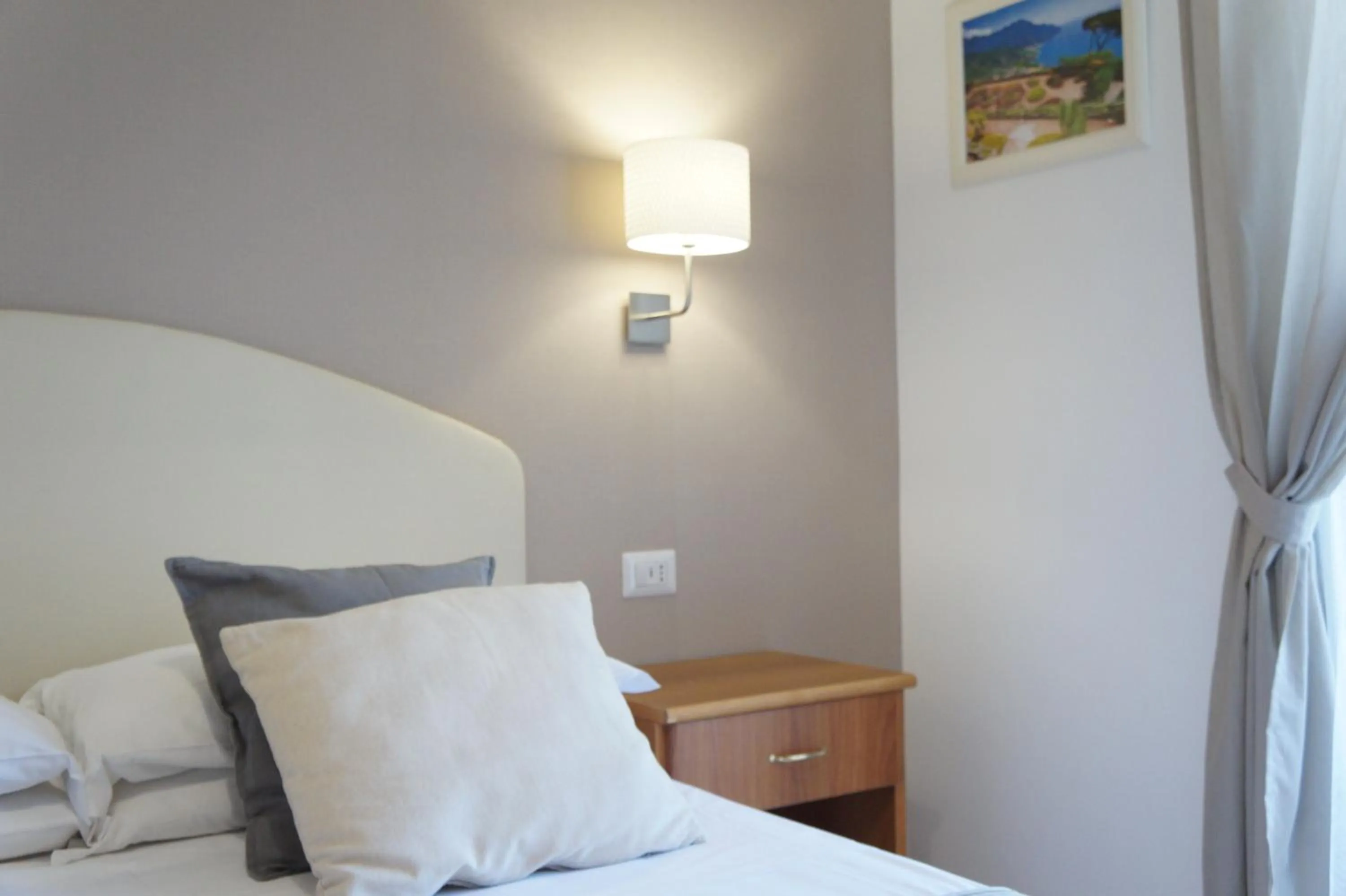 Bed in Villa Susy Relais