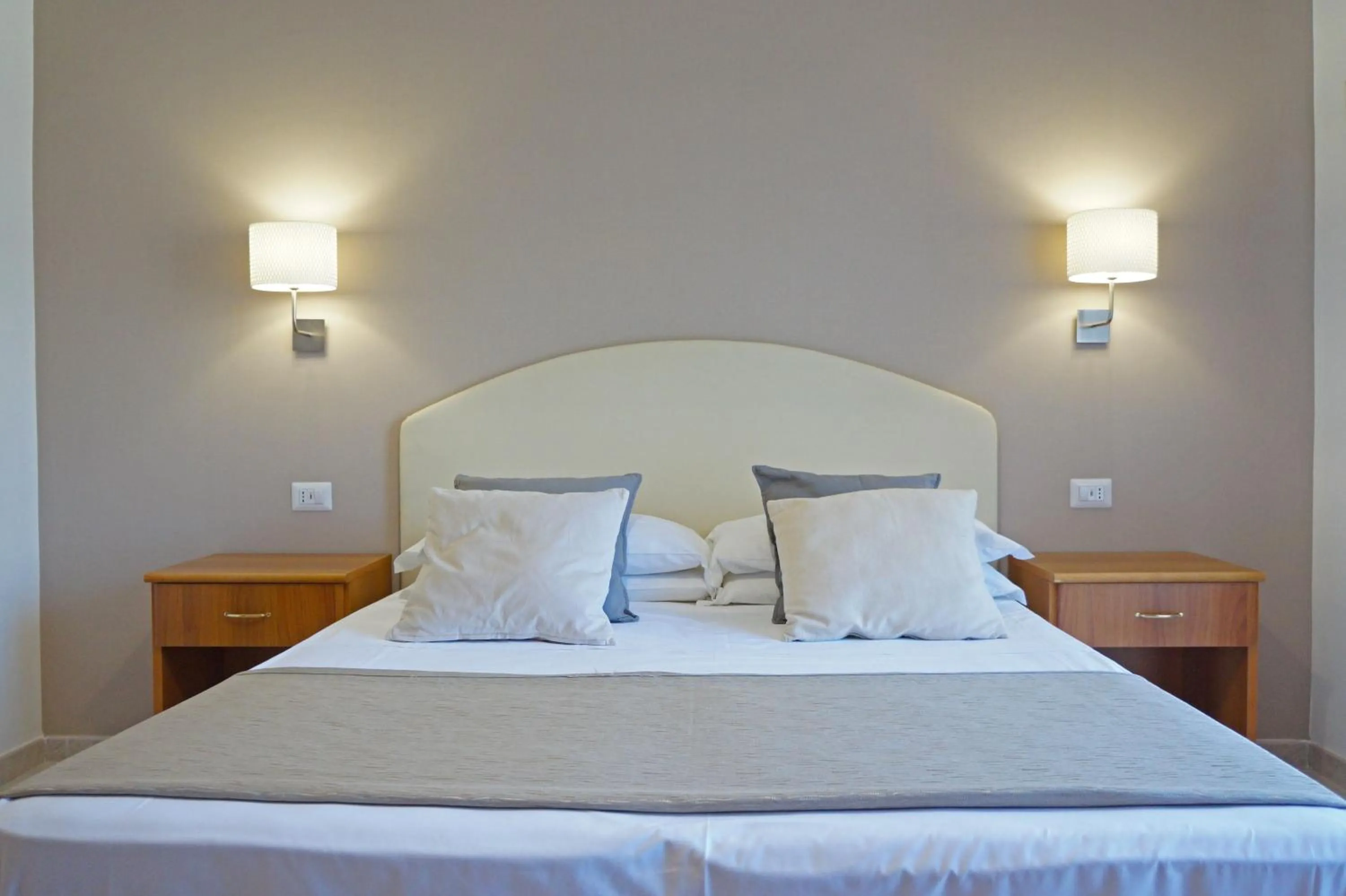 Bed in Villa Susy Relais