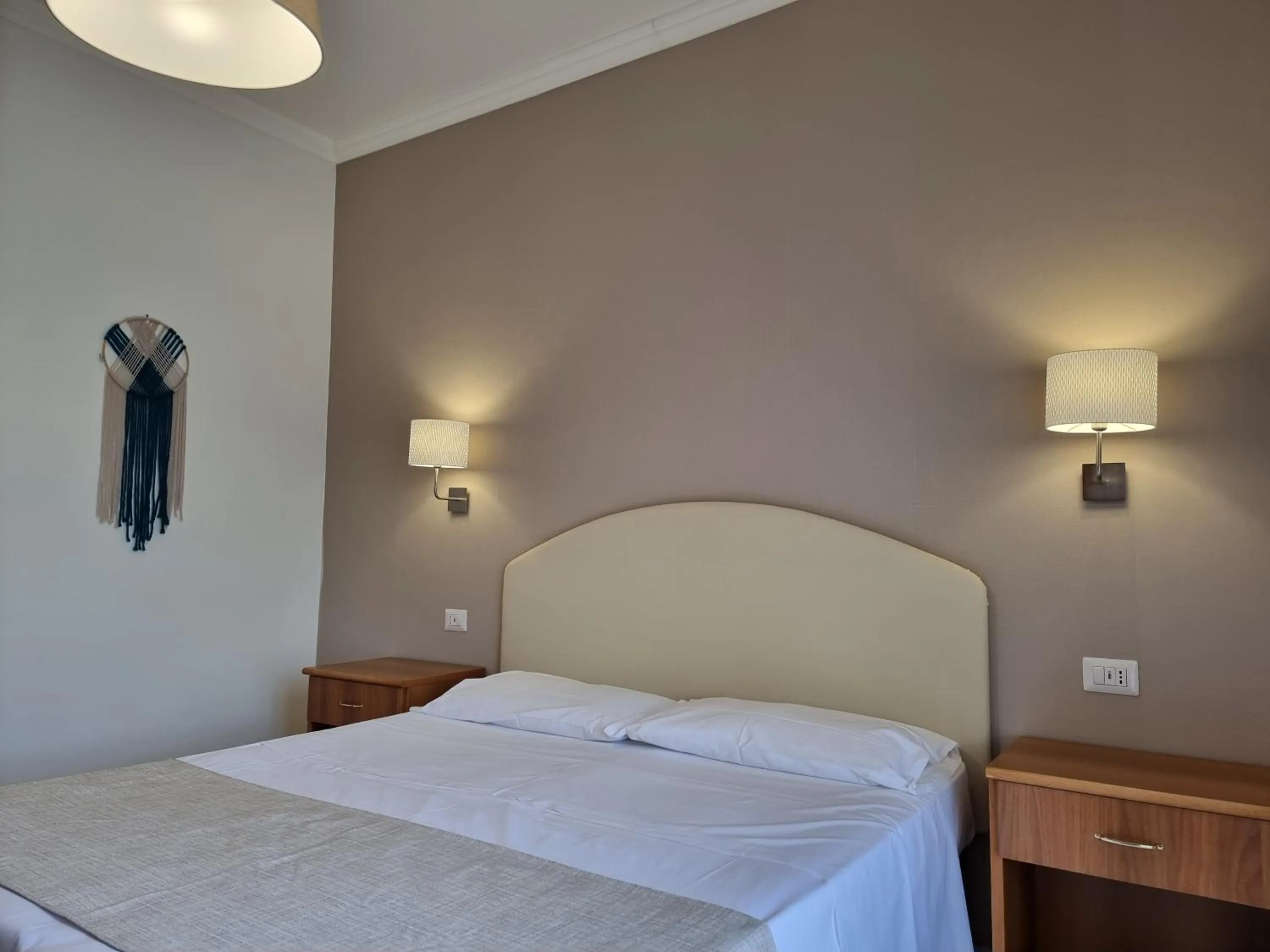 Bed in Villa Susy Relais