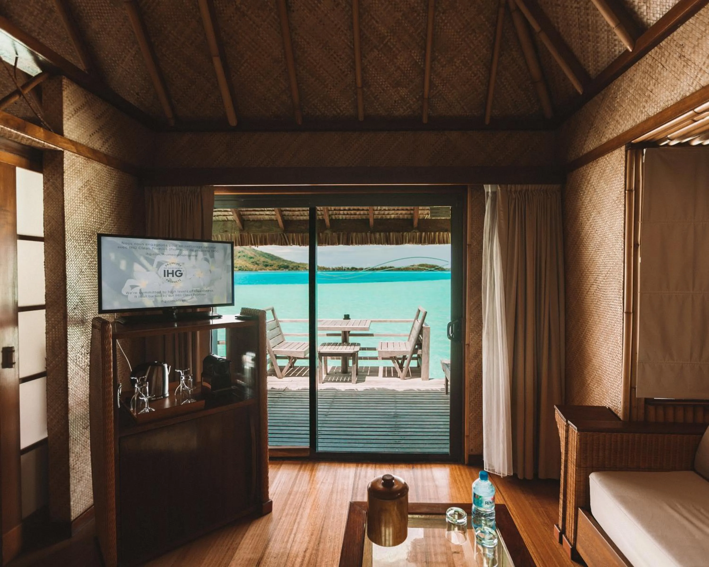 Living room in InterContinental Bora Bora Le Moana Resort by IHG