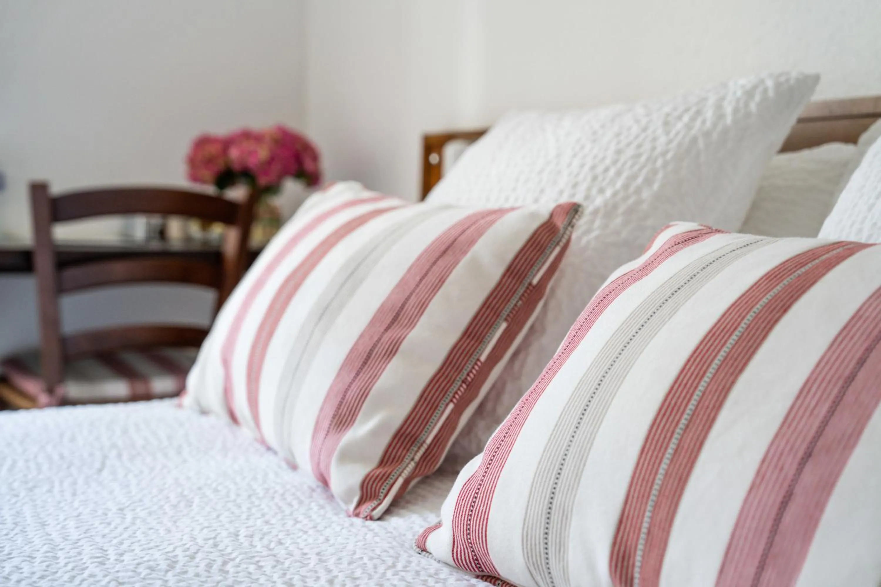 Bed in Logis Hôtel Baratxartea