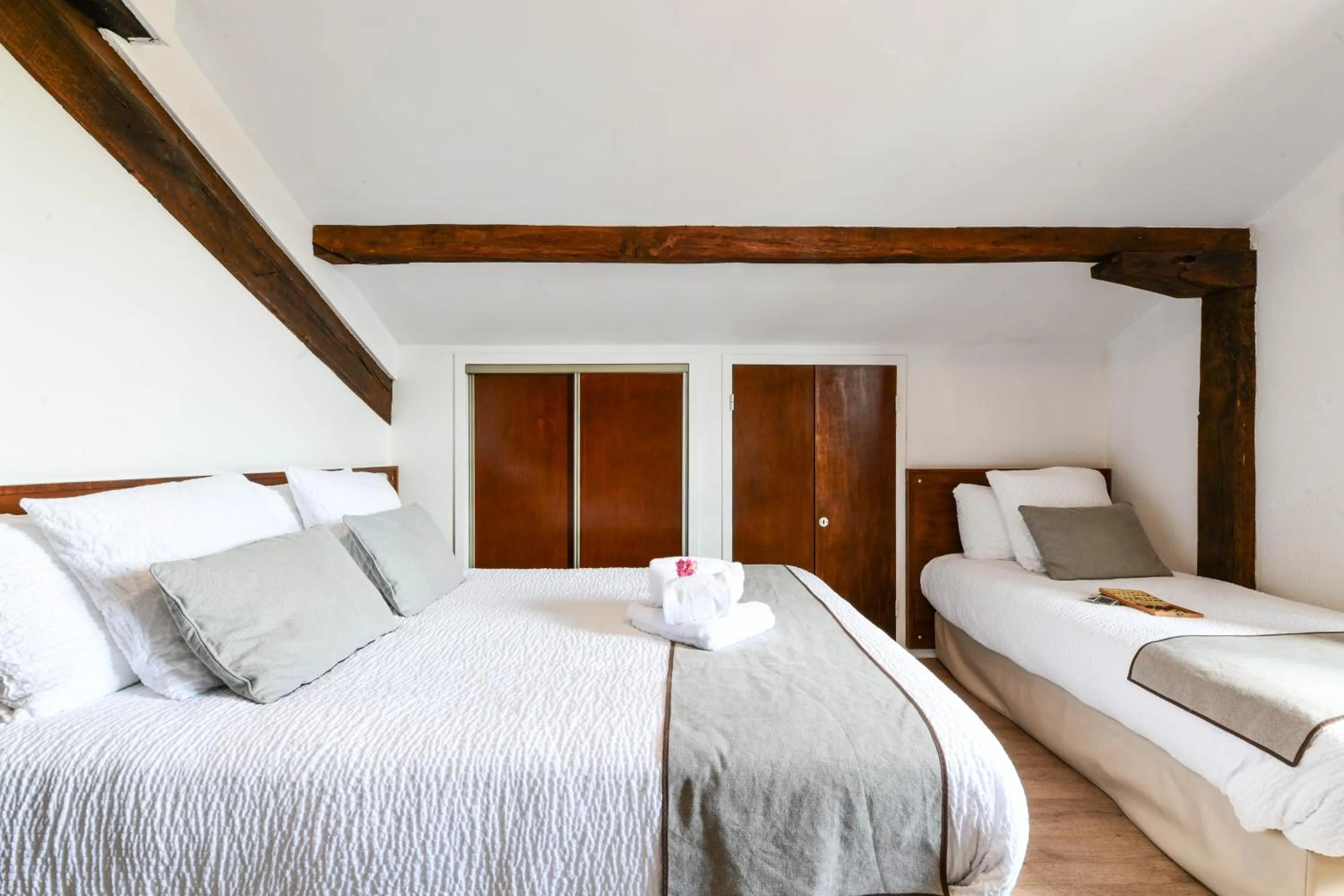 Bed in Logis Hôtel Baratxartea