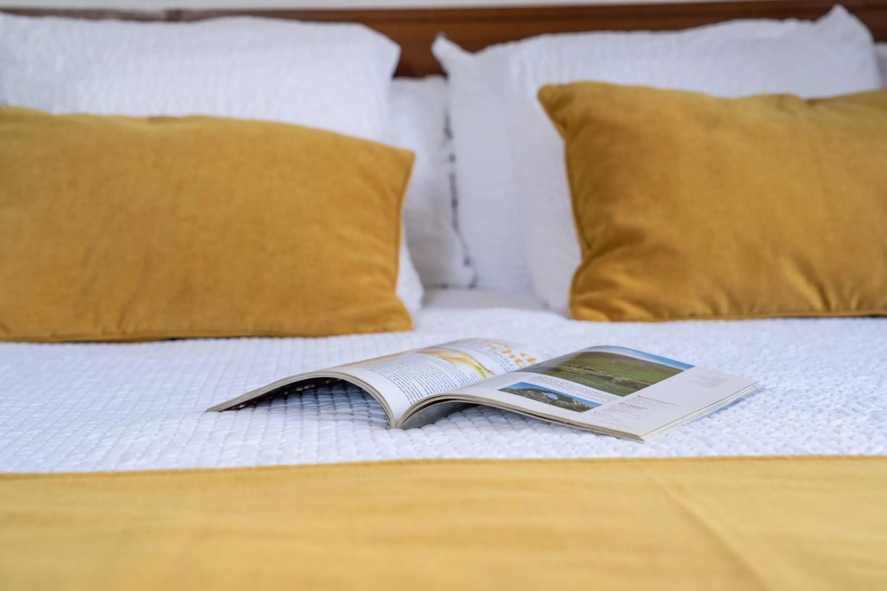 Bed in Logis Hôtel Baratxartea