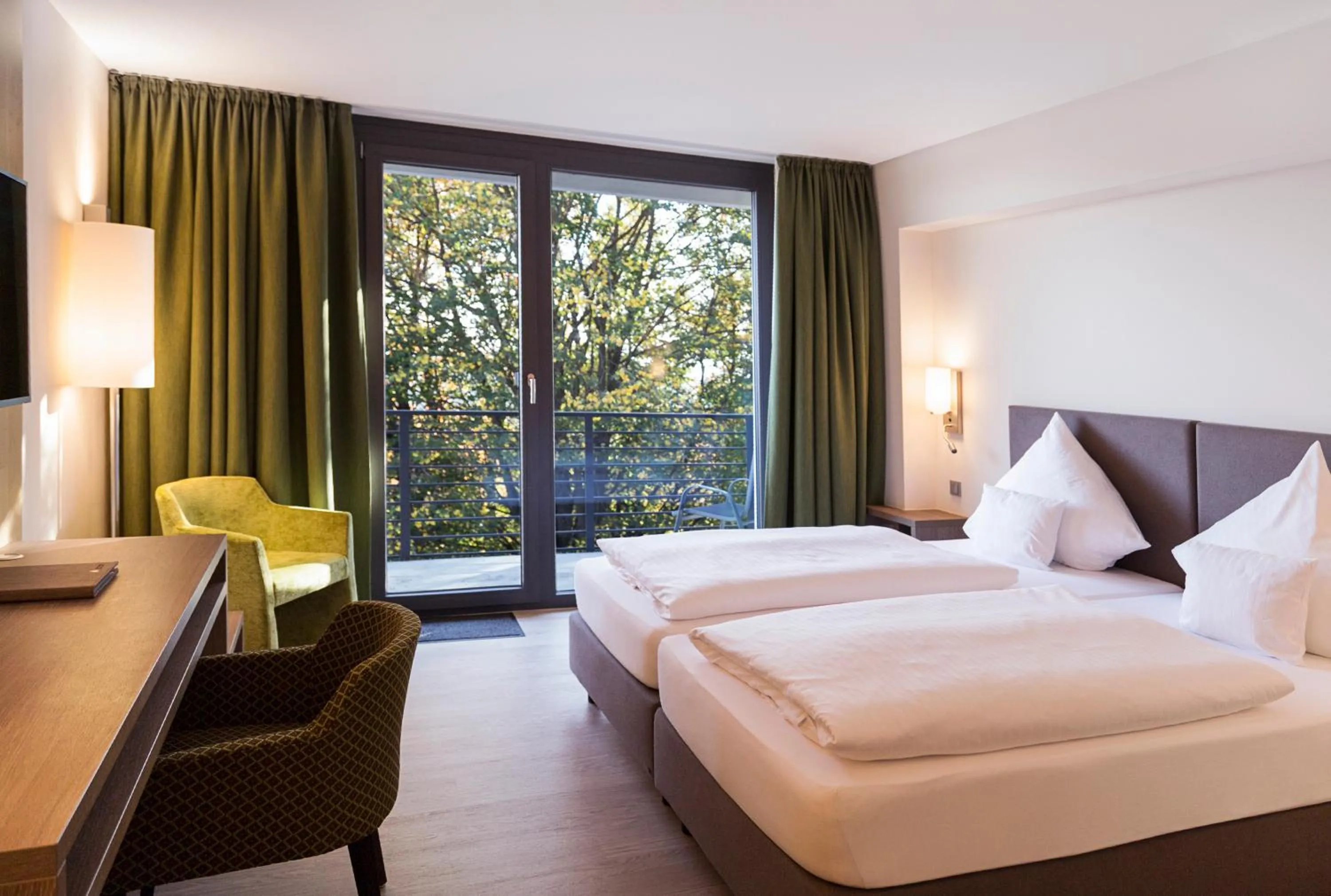 Photo of the whole room, Bed in SeminarZentrum Rückersbach