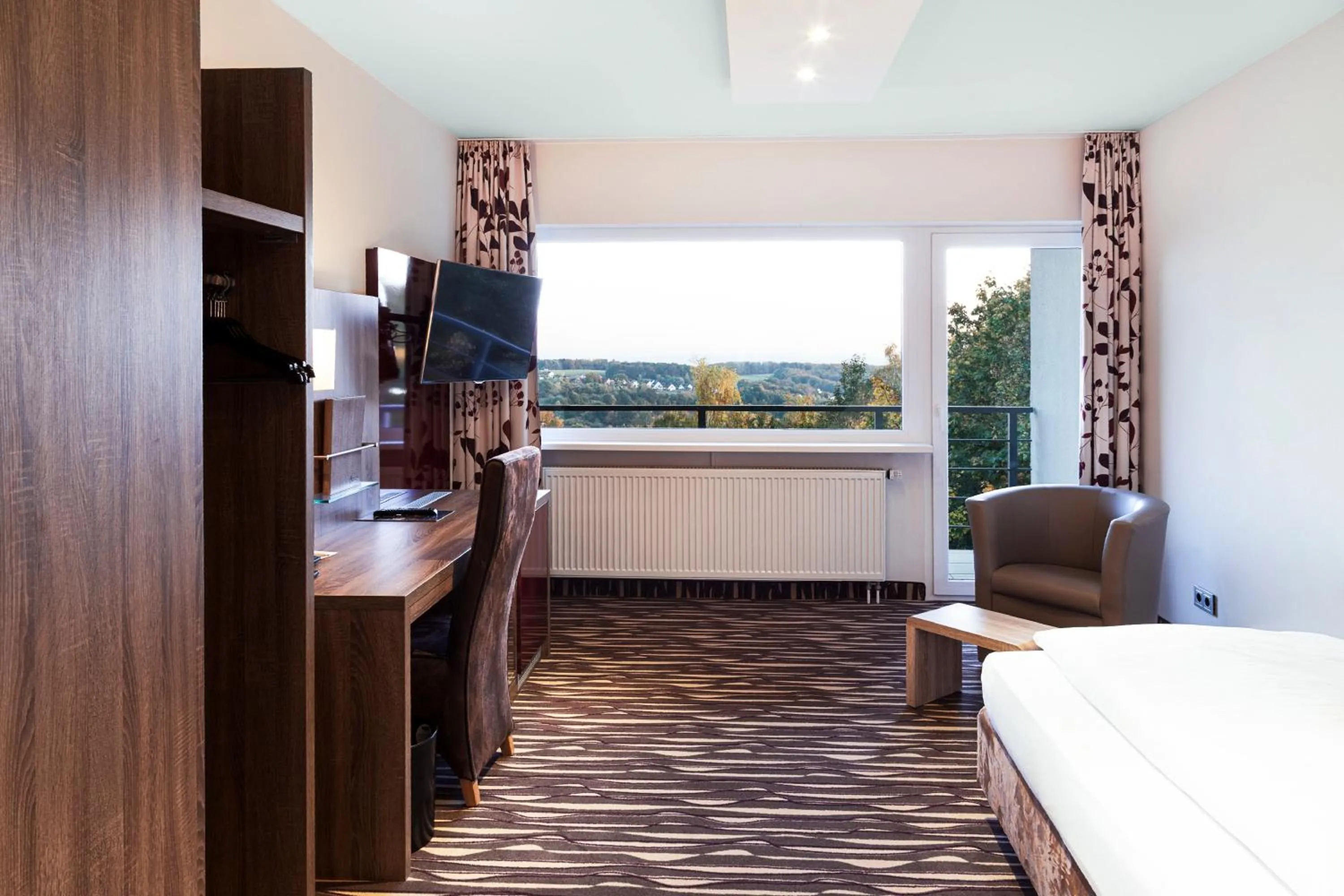 Photo of the whole room, Bed in SeminarZentrum Rückersbach