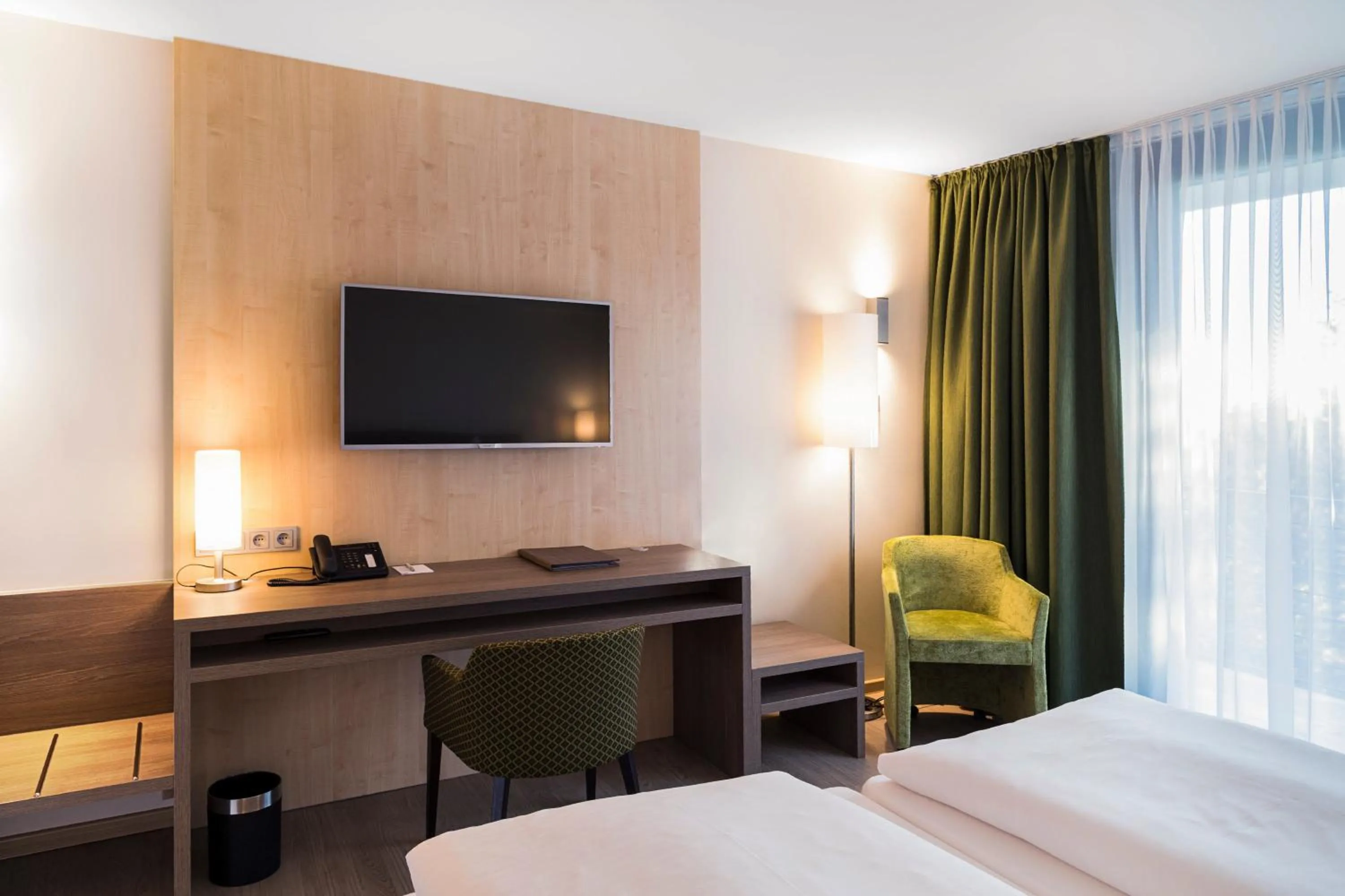 Photo of the whole room, Bed in SeminarZentrum Rückersbach