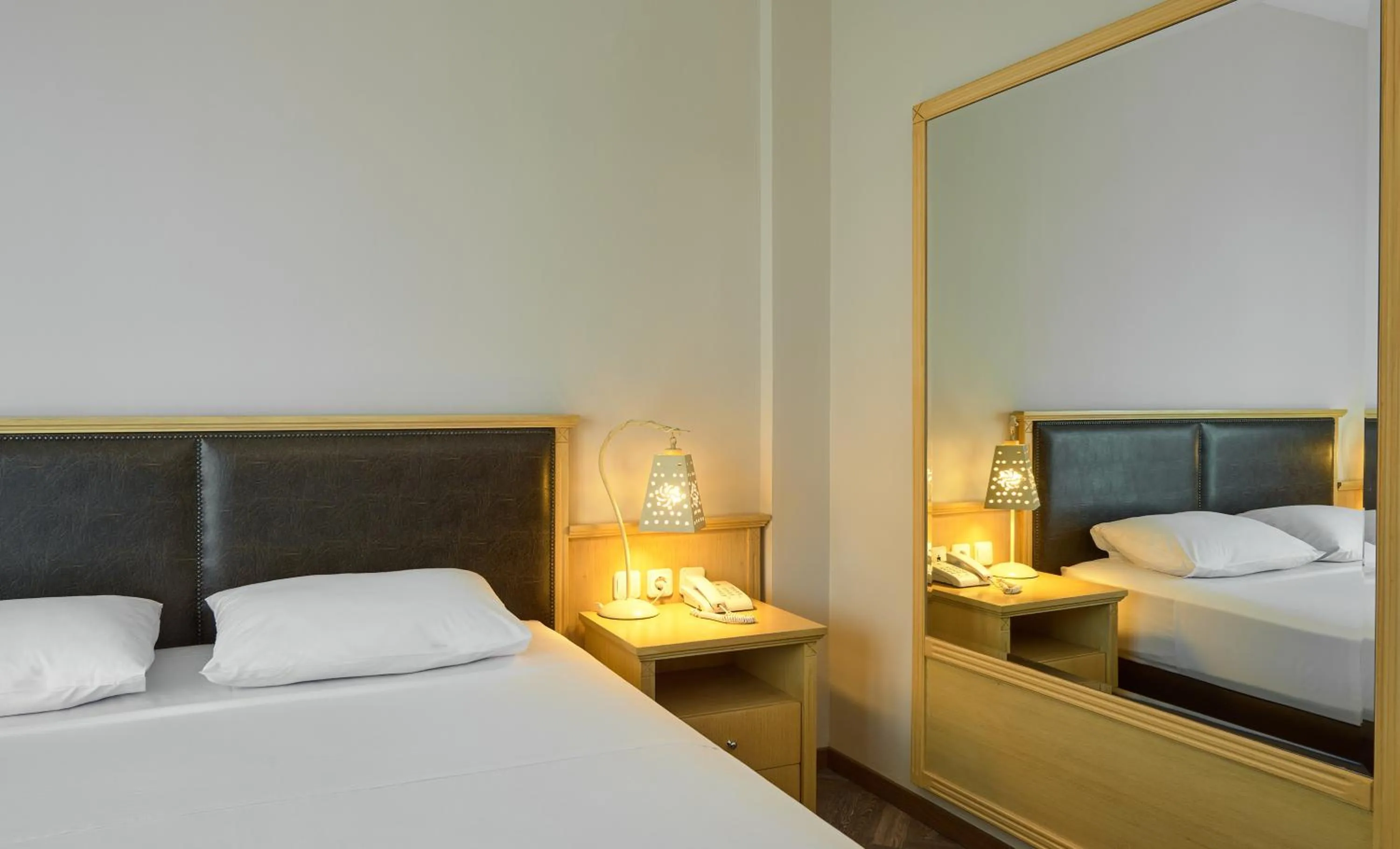 Photo of the whole room, Bed in Iris Hotel