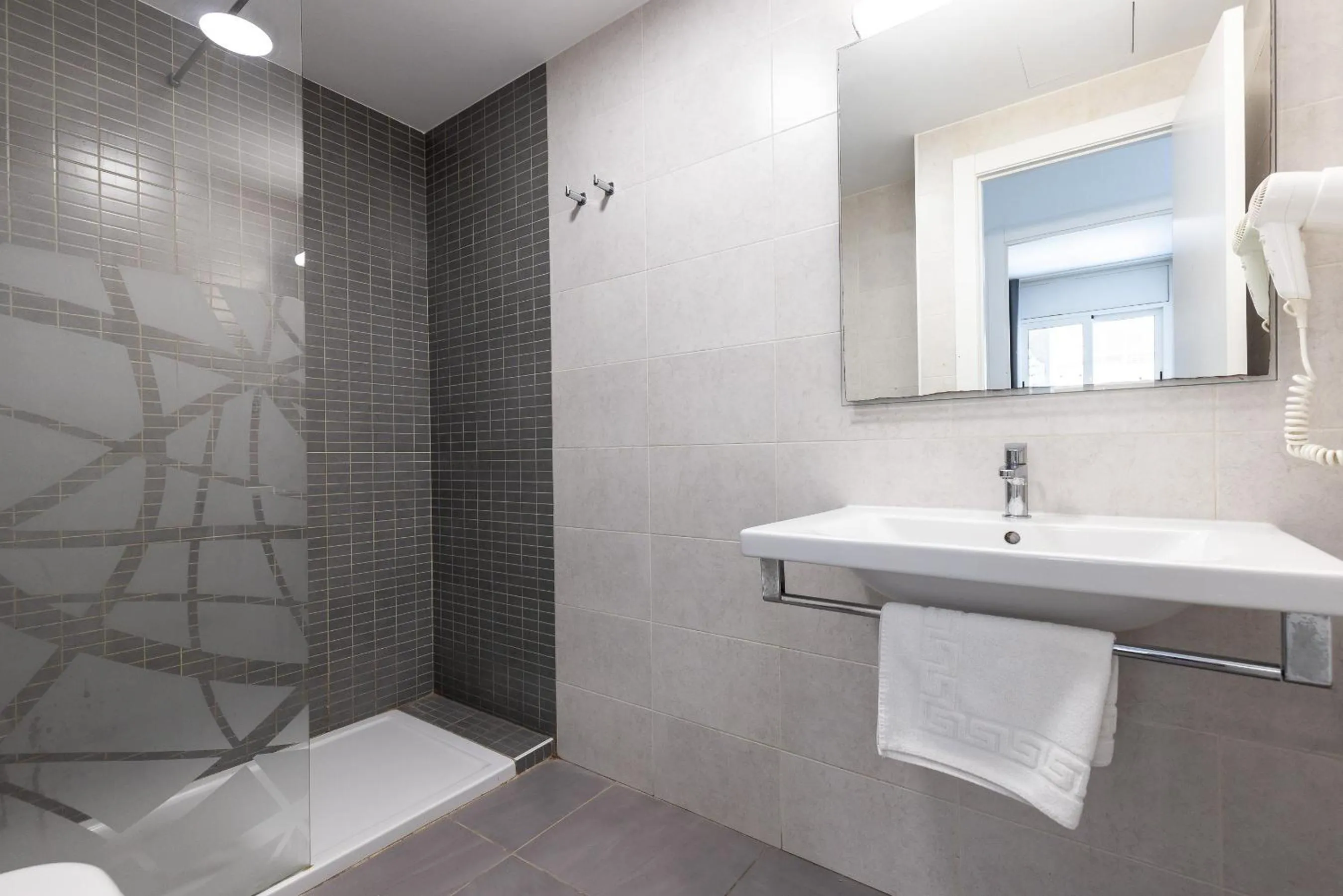 Shower in Rentalmar Zahara family suites