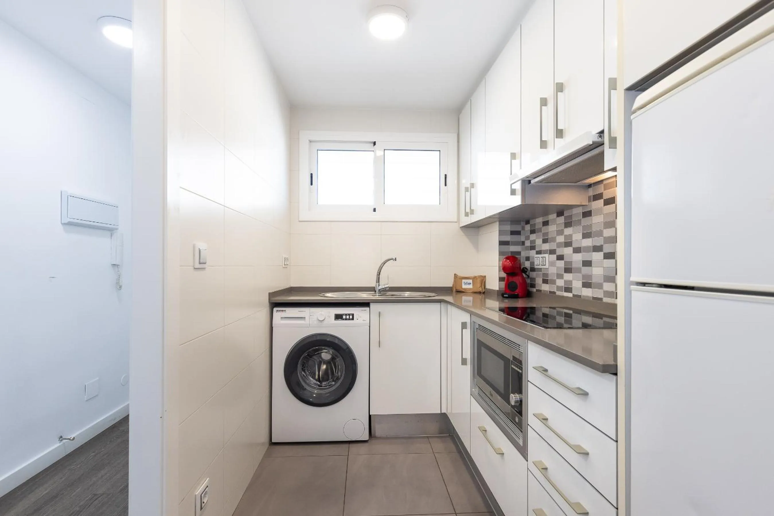 Kitchen or kitchenette in Rentalmar Zahara family suites