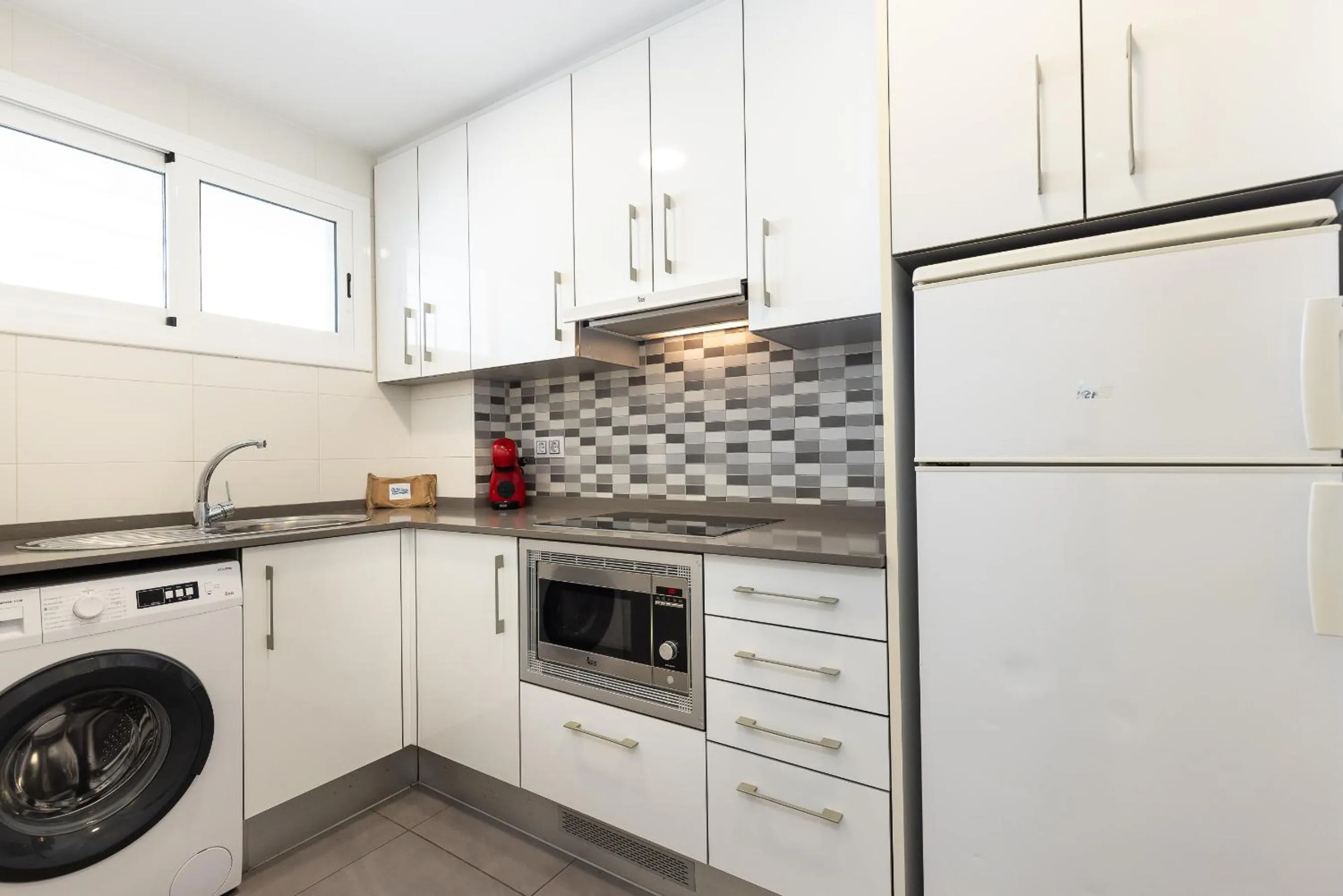 Kitchen or kitchenette in Rentalmar Zahara family suites