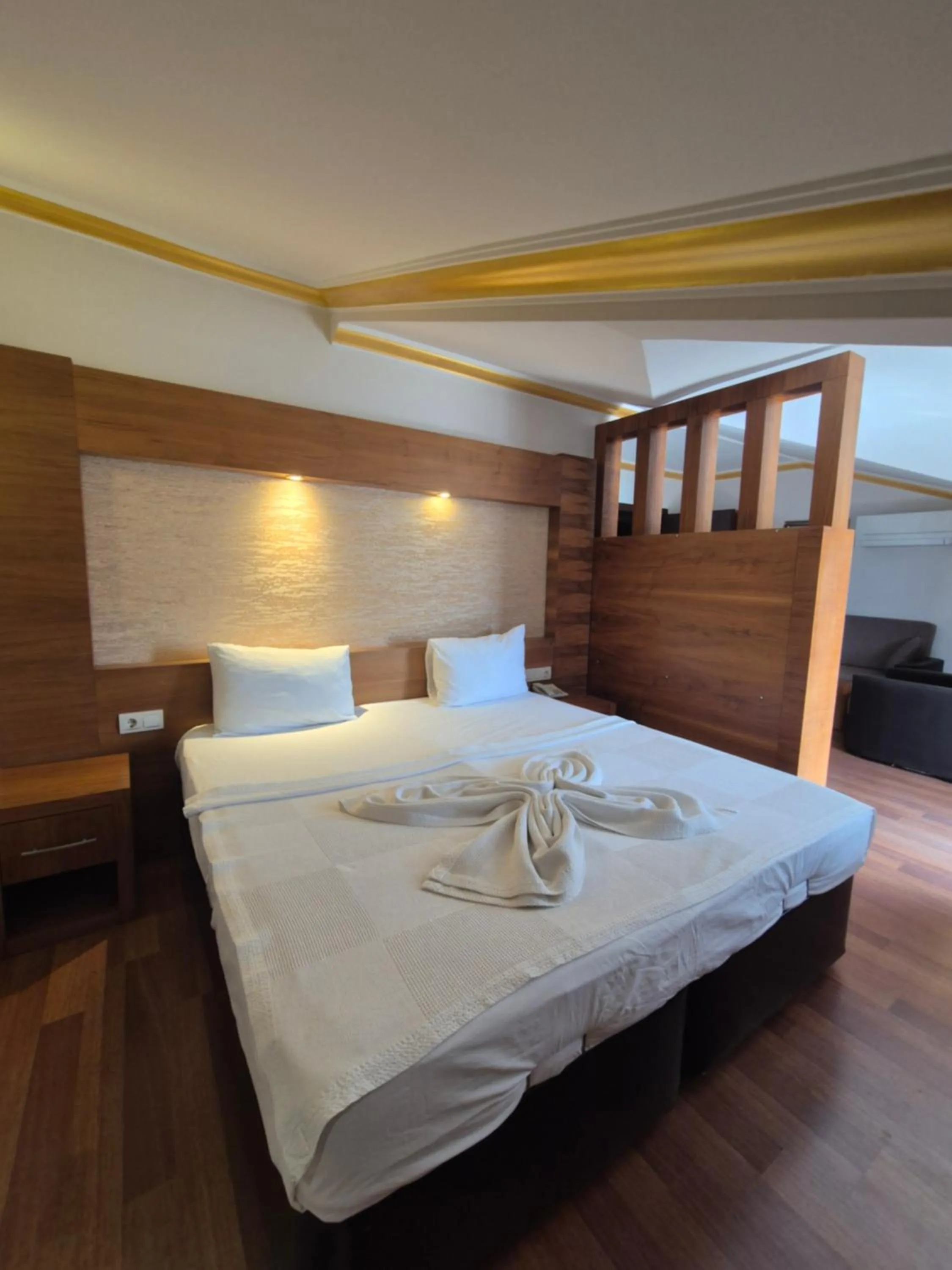 Bed in Dinara Apart Hotel
