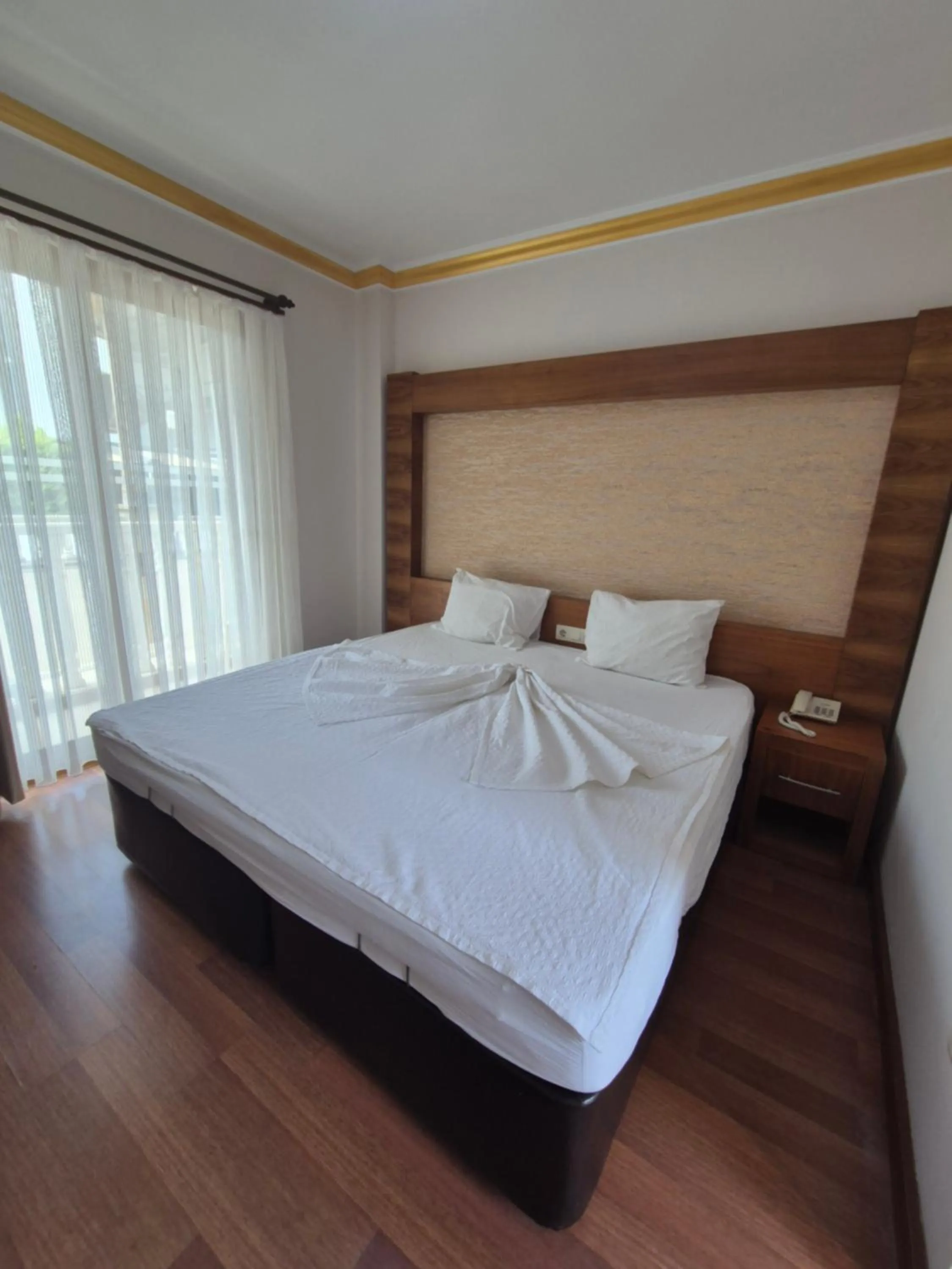 Bed in Dinara Apart Hotel