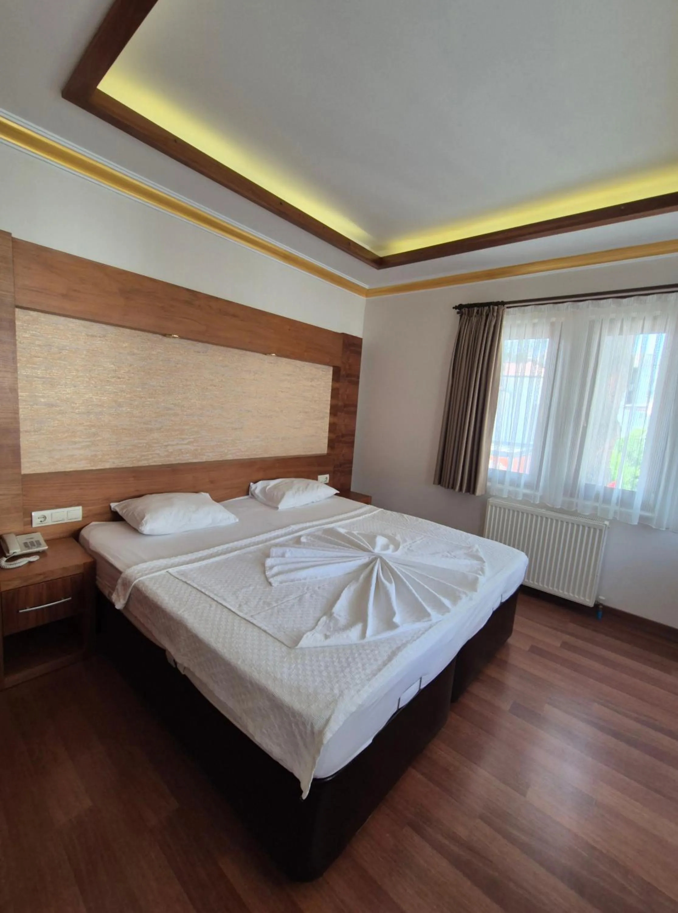 Bed in Dinara Apart Hotel