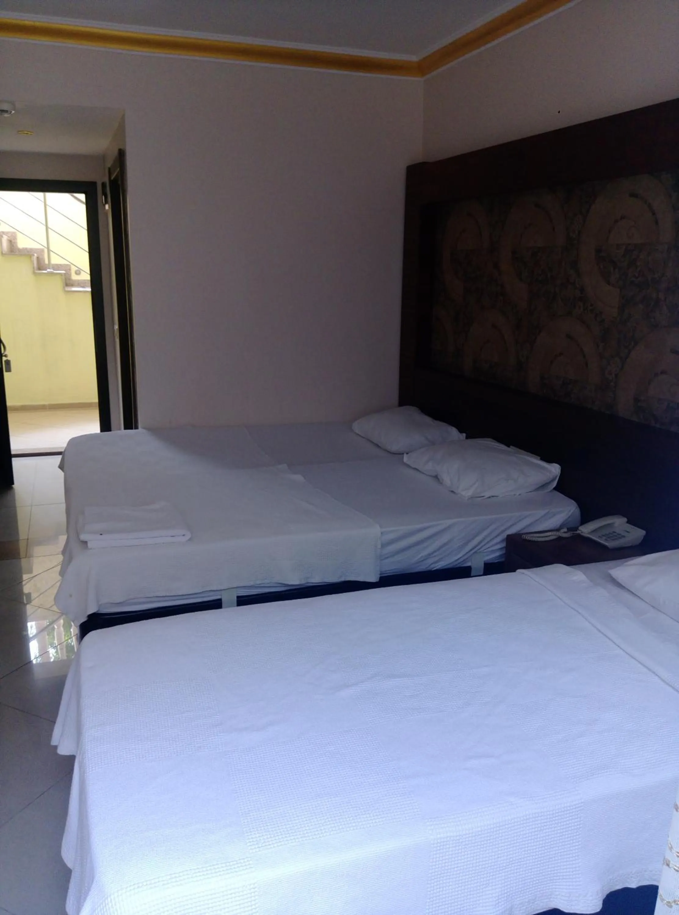 Bed in Dinara Apart Hotel