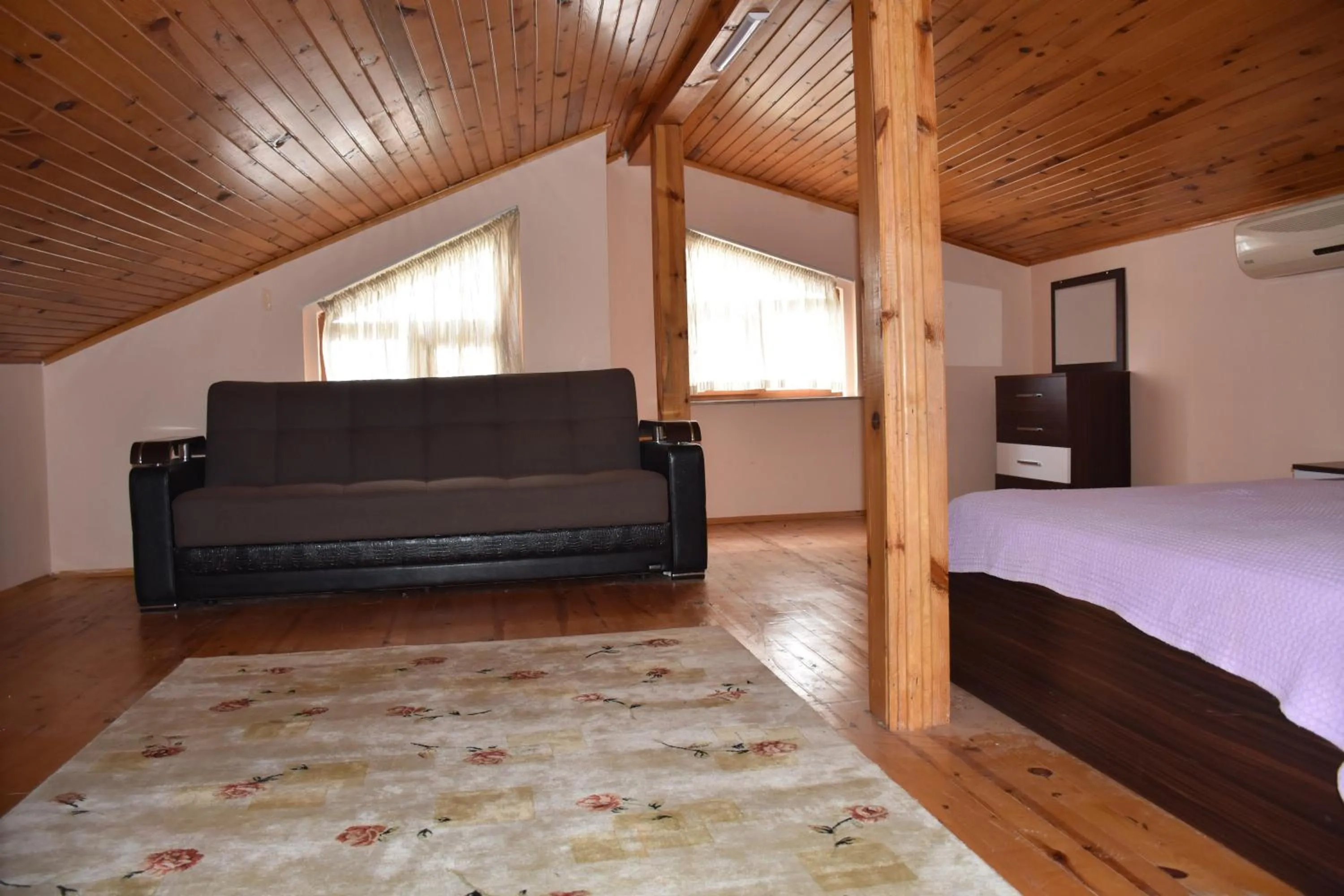 Bedroom in Dinara Apart Hotel