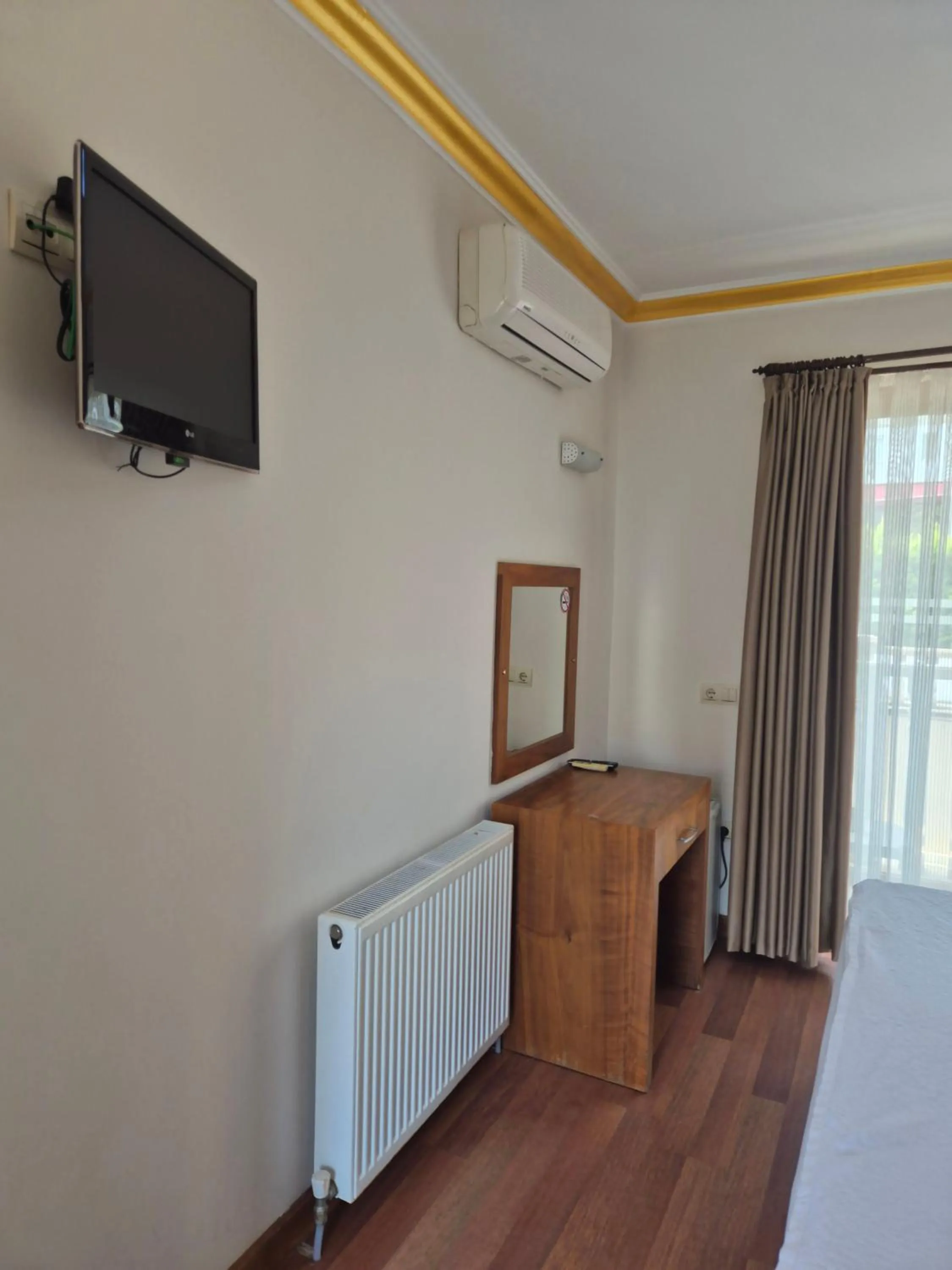 TV and multimedia in Dinara Apart Hotel