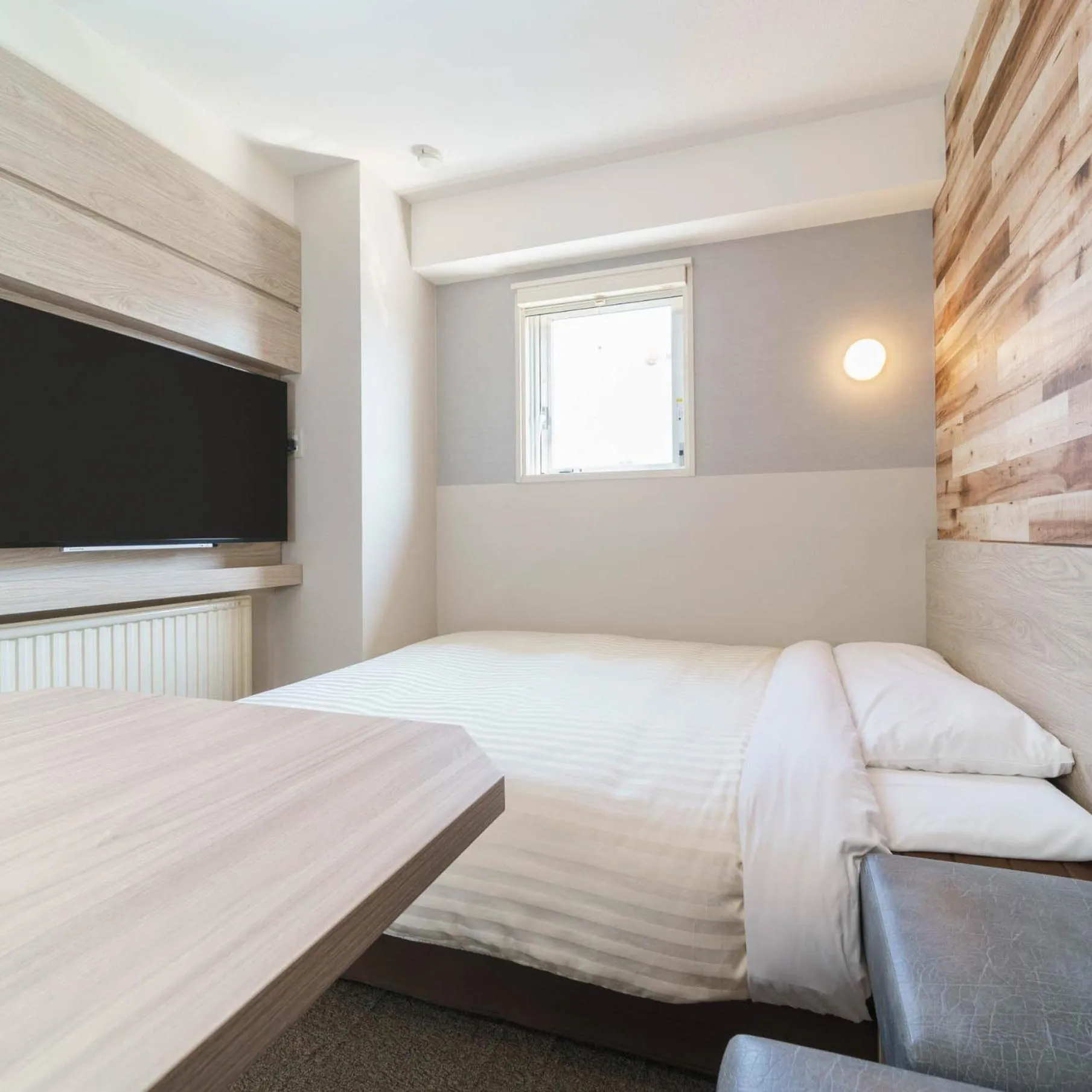 Bed in Super Hotel Kushiro Kurogane