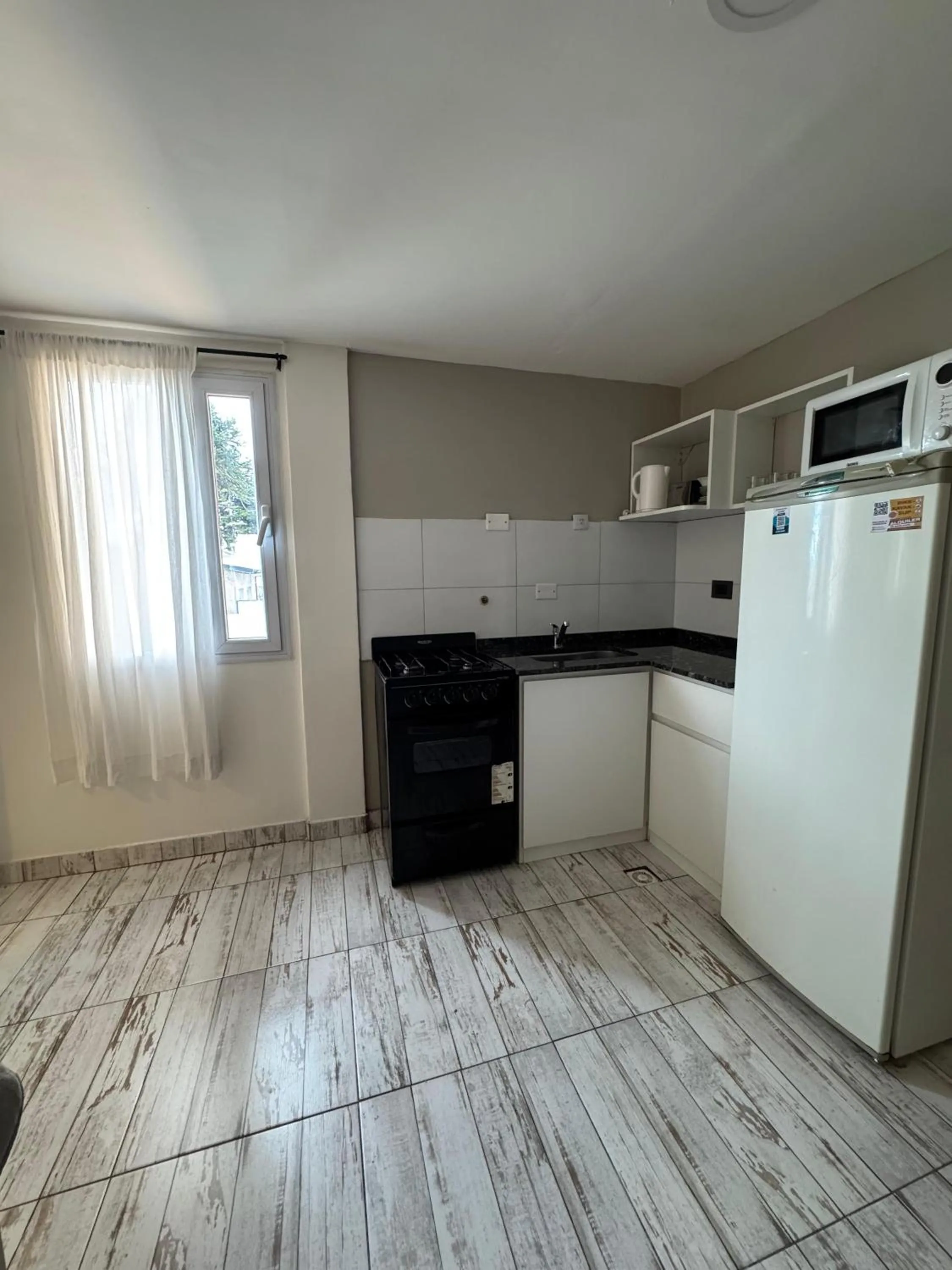 Kitchen or kitchenette in Antu Mahuida Apartments