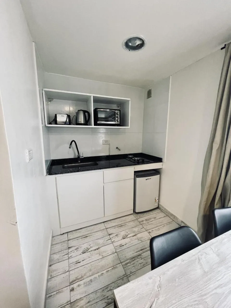 Kitchen or kitchenette in Antu Mahuida Apartments