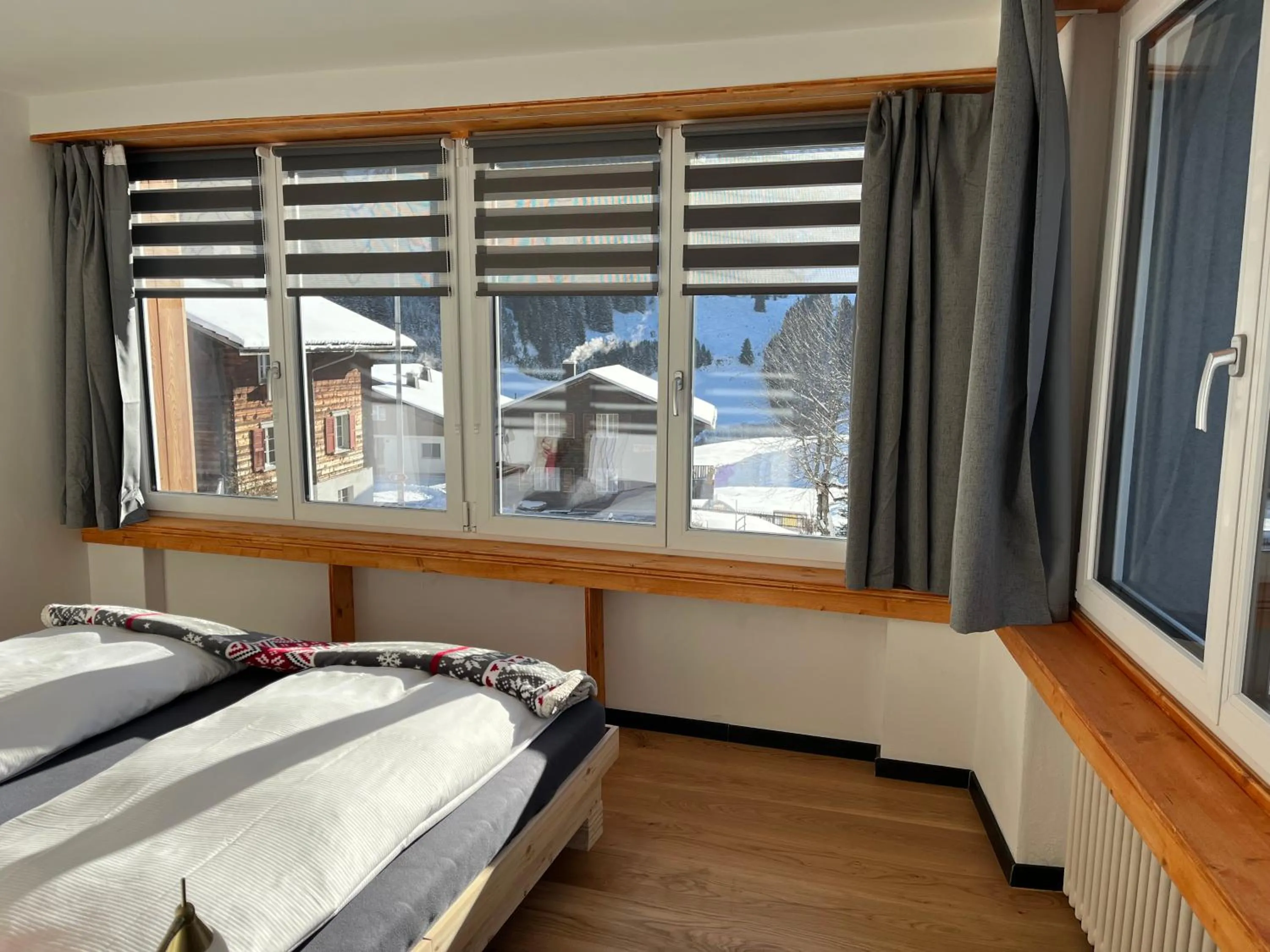 Photo of the whole room, Bed in Mountain Lodge Sedrun