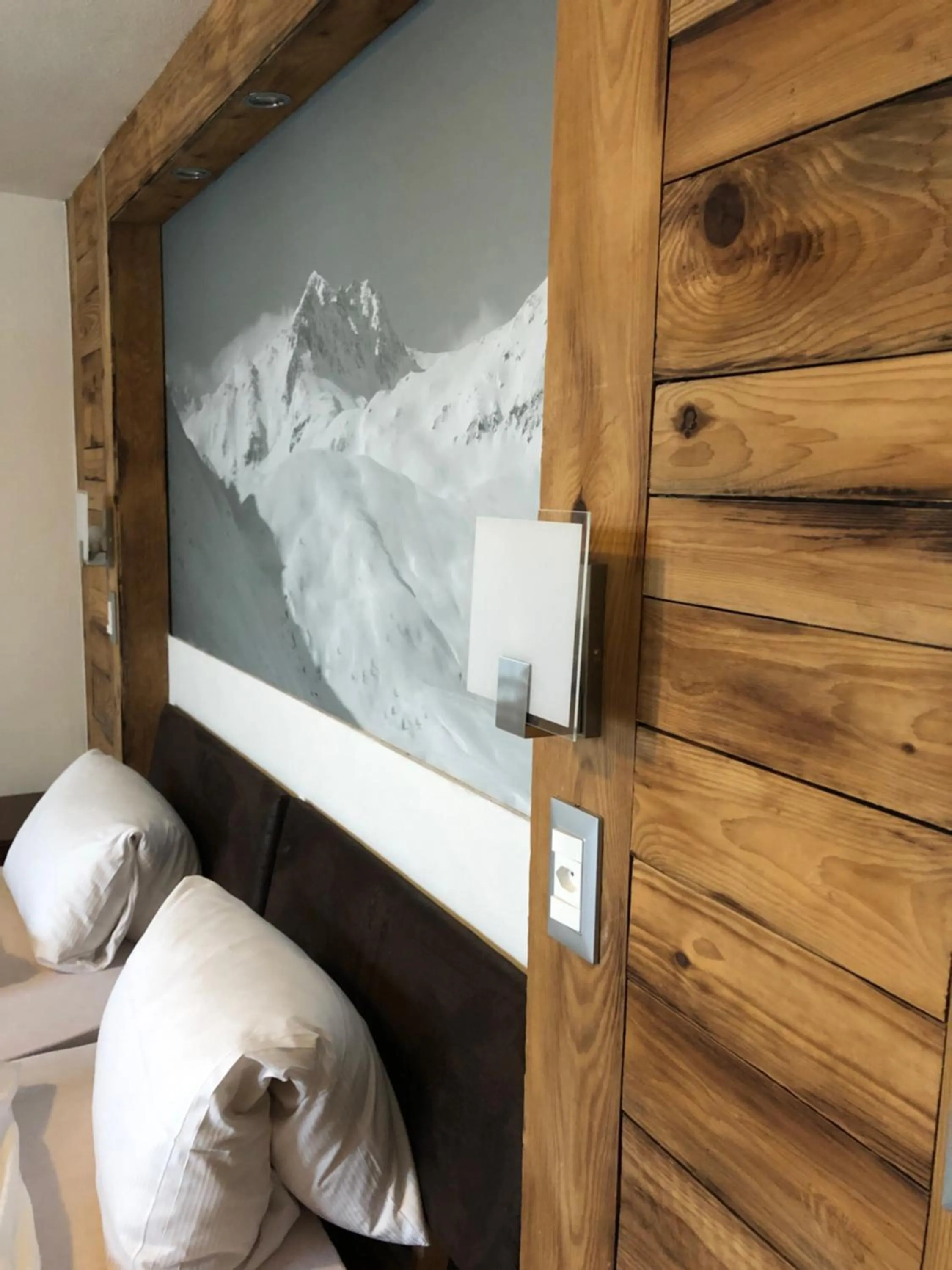 Decorative detail, Bed in Mountain Lodge Sedrun