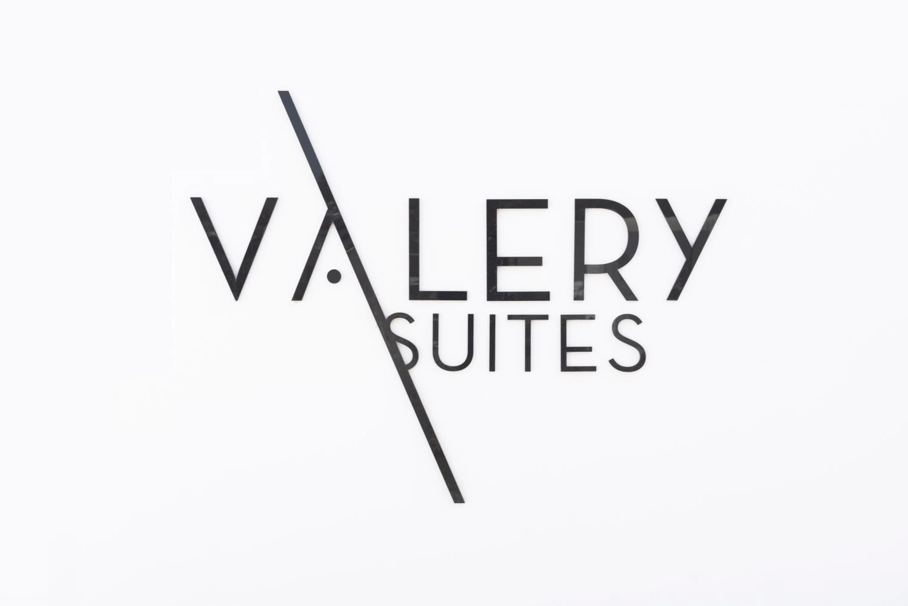 Property logo or sign in Valery Suites