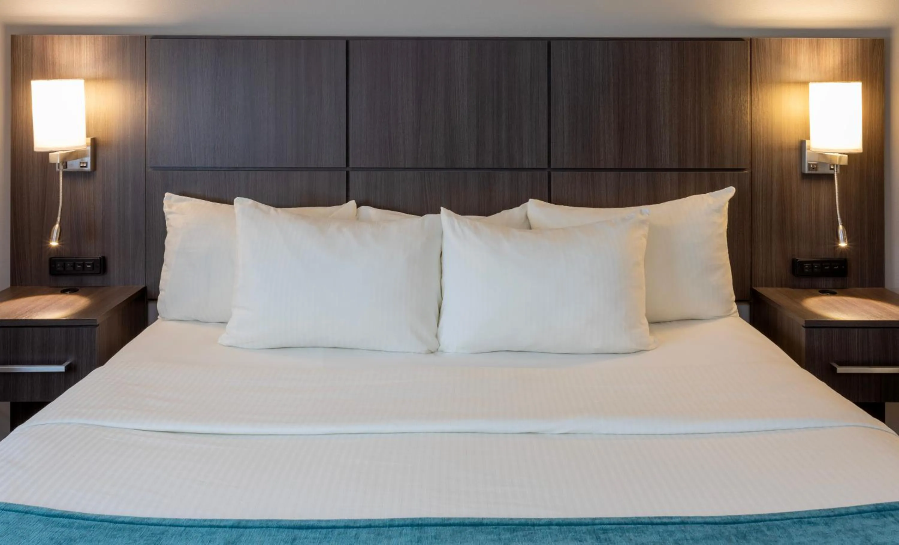 Bed in Paynesville Inn & Suites