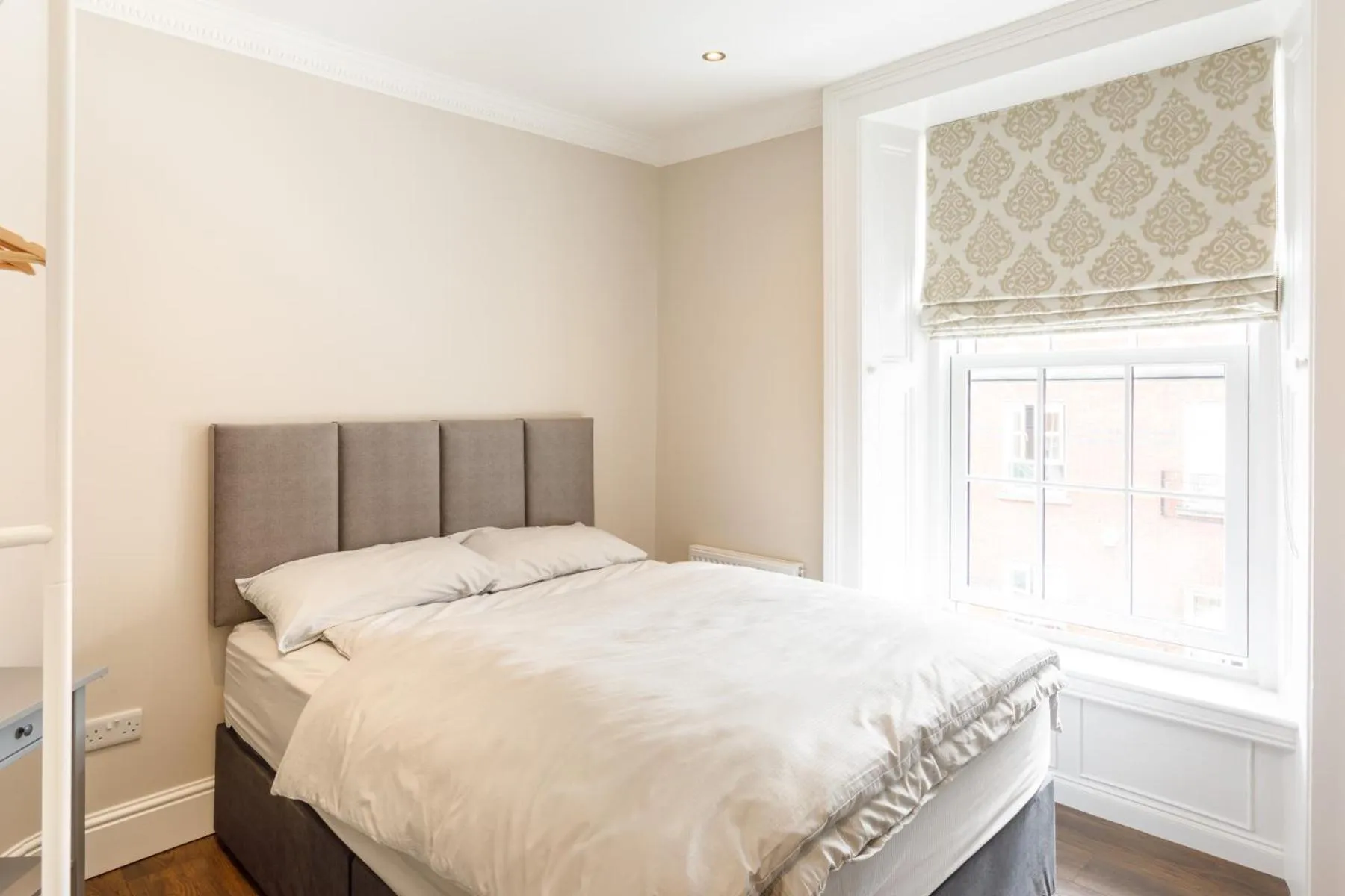 Bed in Molloys Apartments