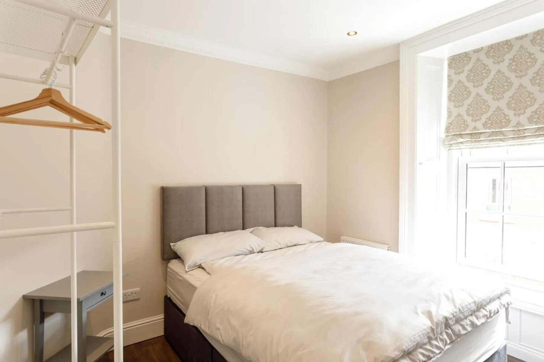 Bed in Molloys Apartments